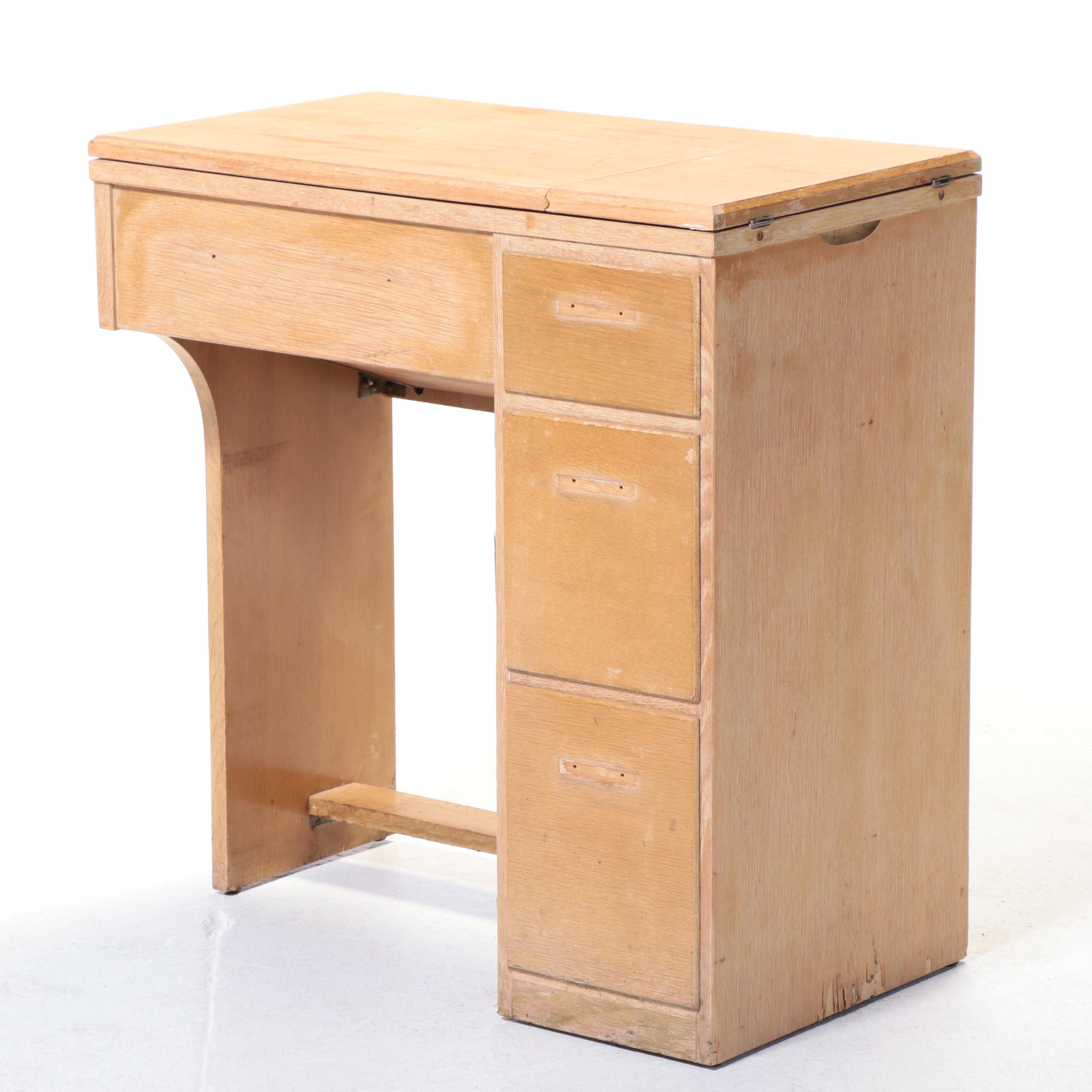 Singer Electric Sewing Machine on Sewing Cabinet with Seat and Notions, 1950s