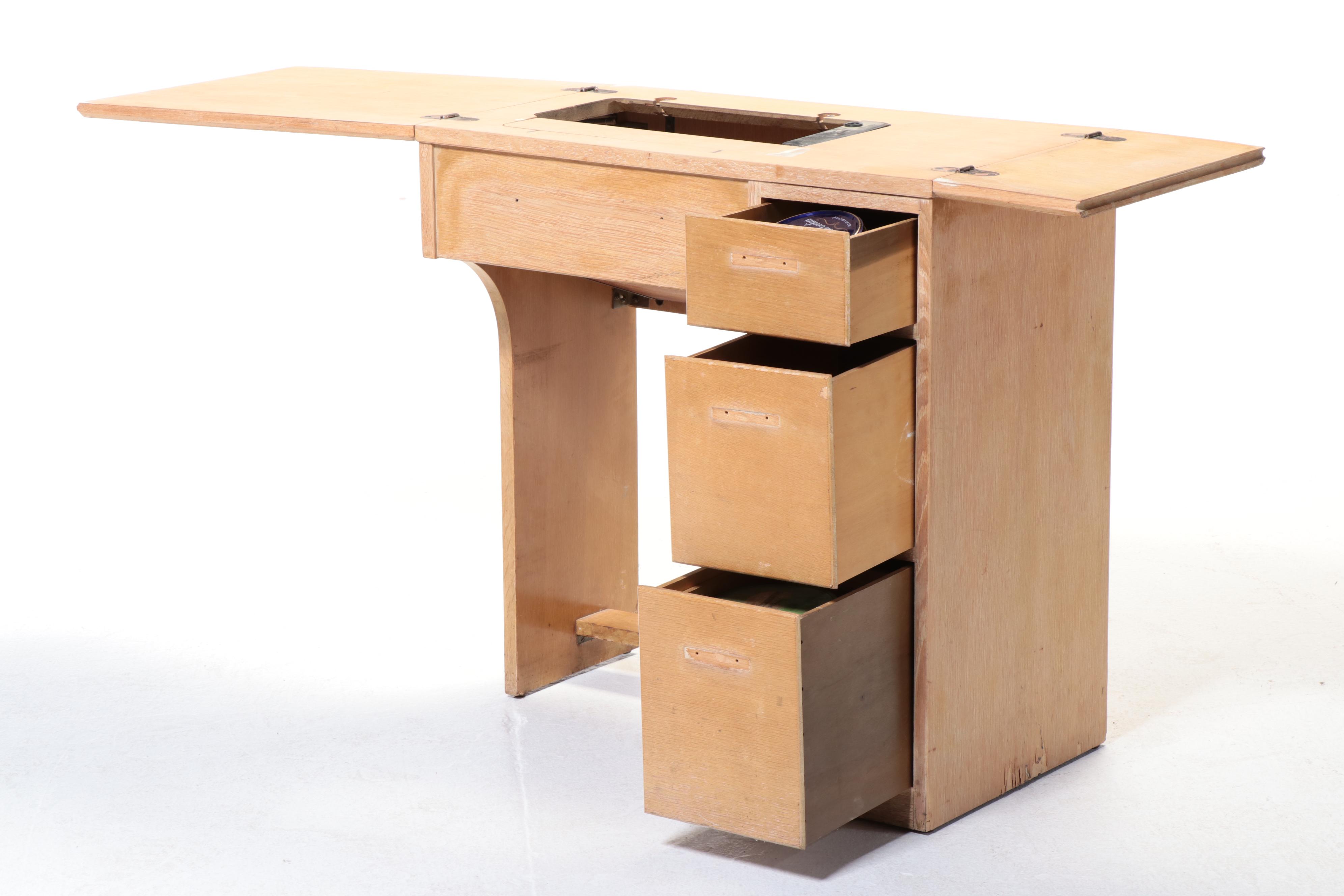 Singer Electric Sewing Machine on Sewing Cabinet with Seat and Notions, 1950s