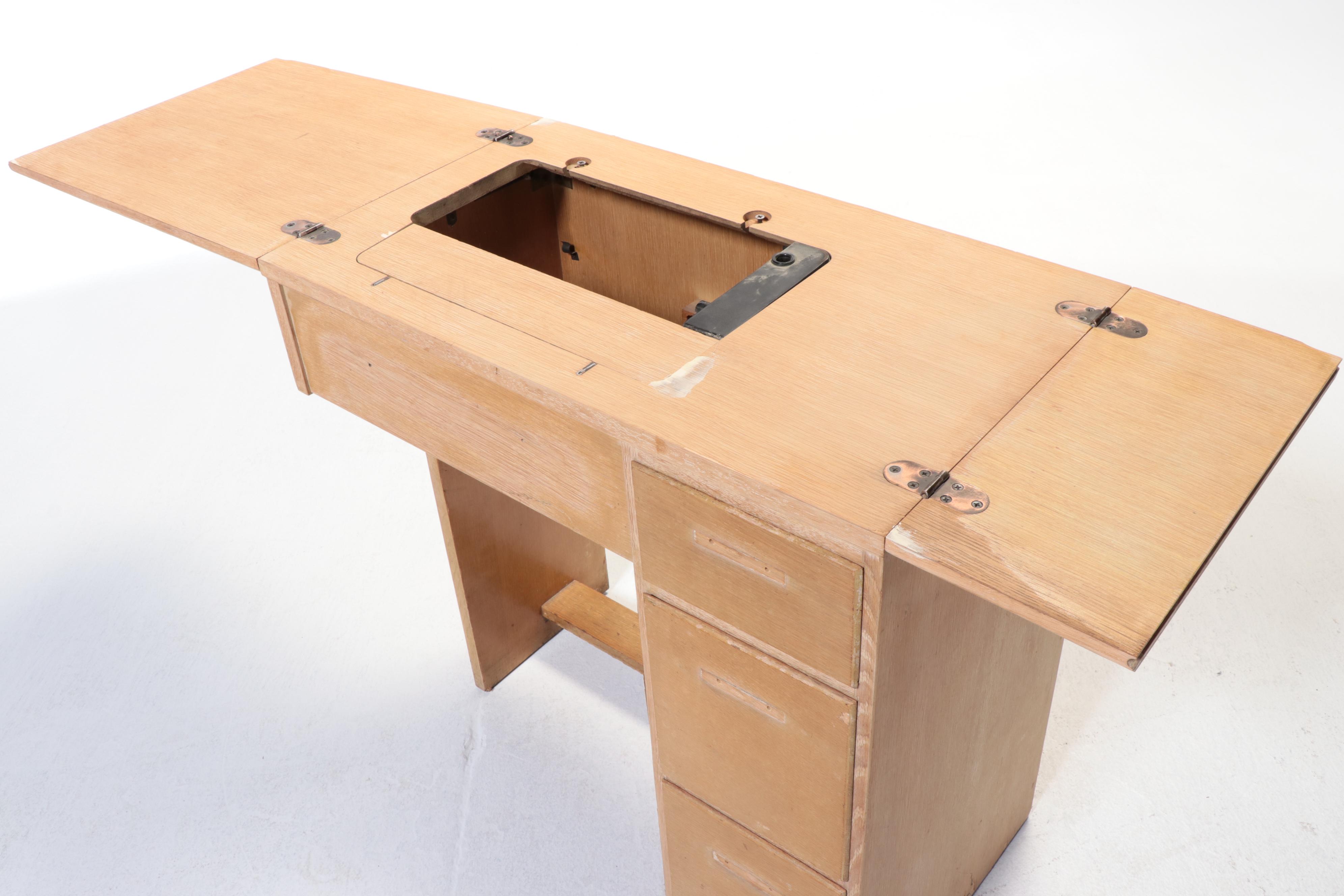 Singer Electric Sewing Machine on Sewing Cabinet with Seat and Notions, 1950s