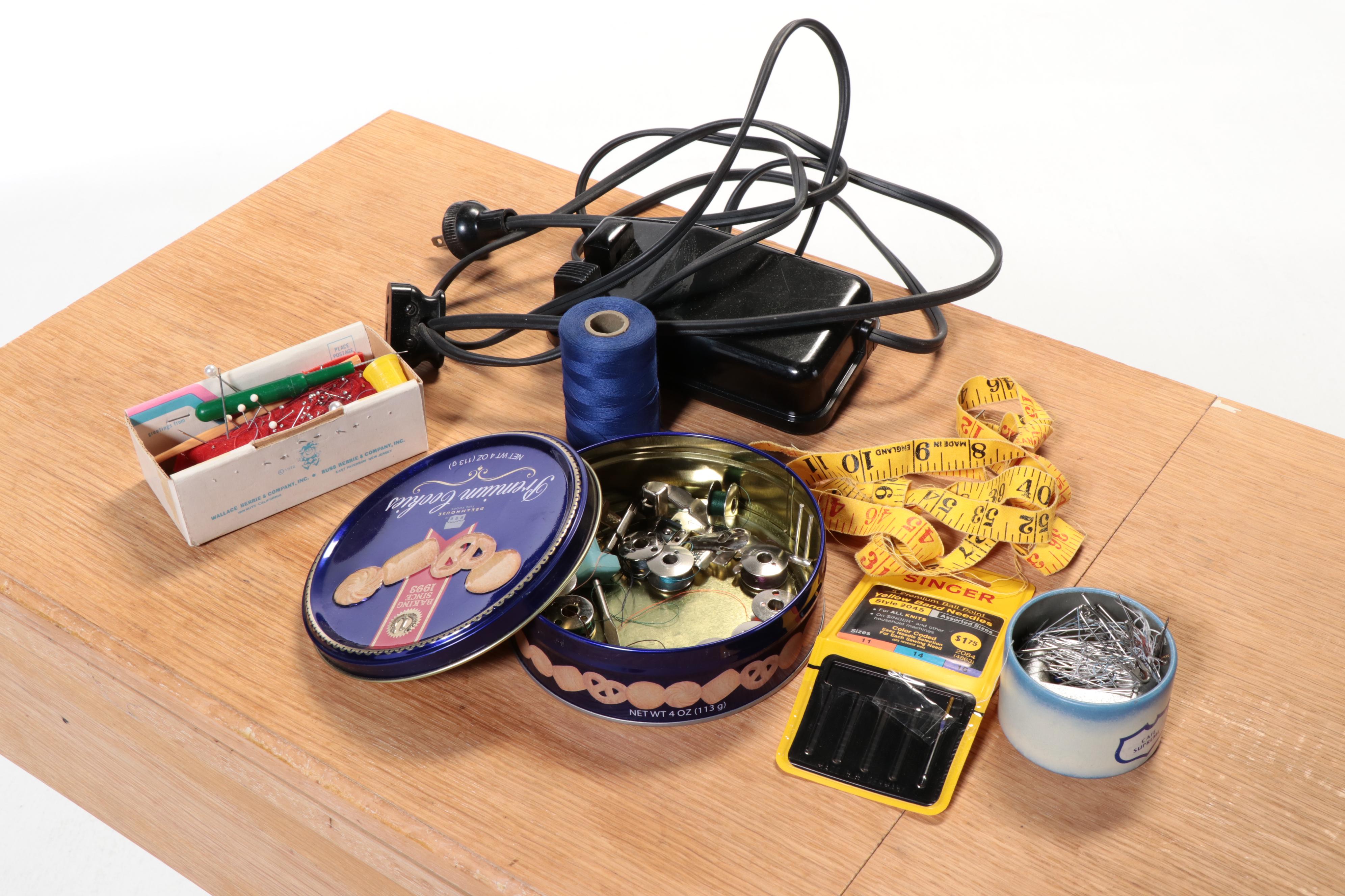 Singer Electric Sewing Machine on Sewing Cabinet with Seat and Notions, 1950s