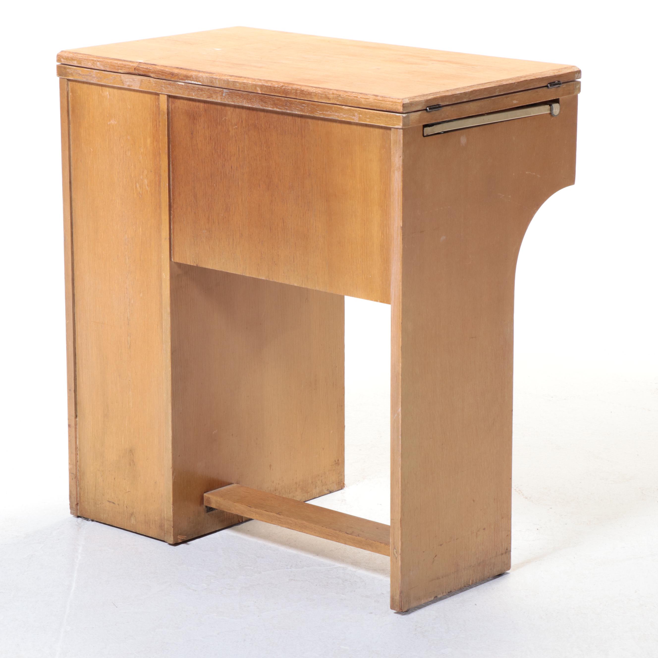 Singer Electric Sewing Machine on Sewing Cabinet with Seat and Notions, 1950s