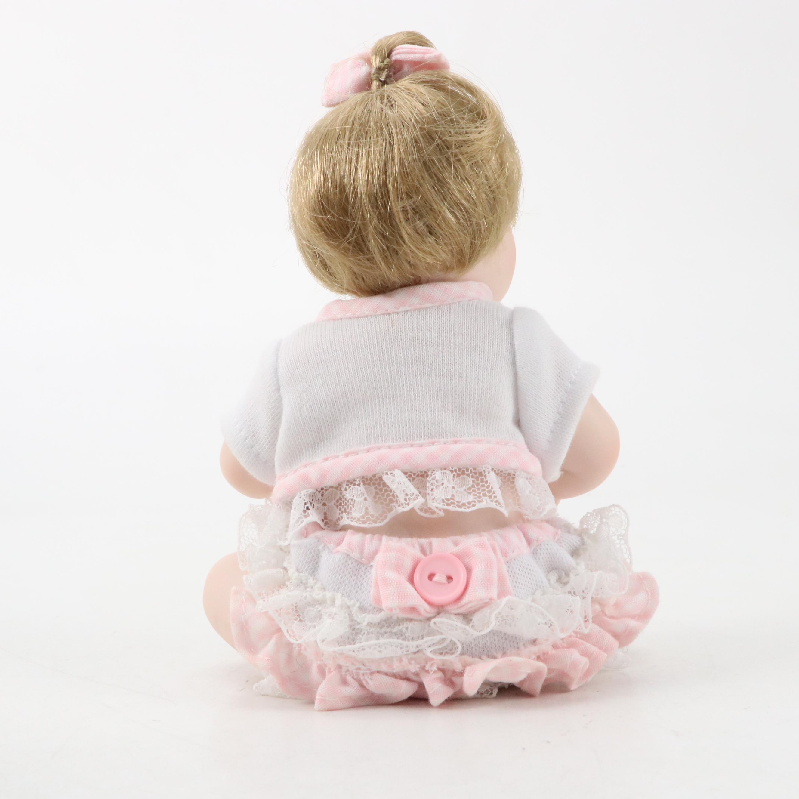 The Ashton-Drake Galleries Bisque Collector Dolls