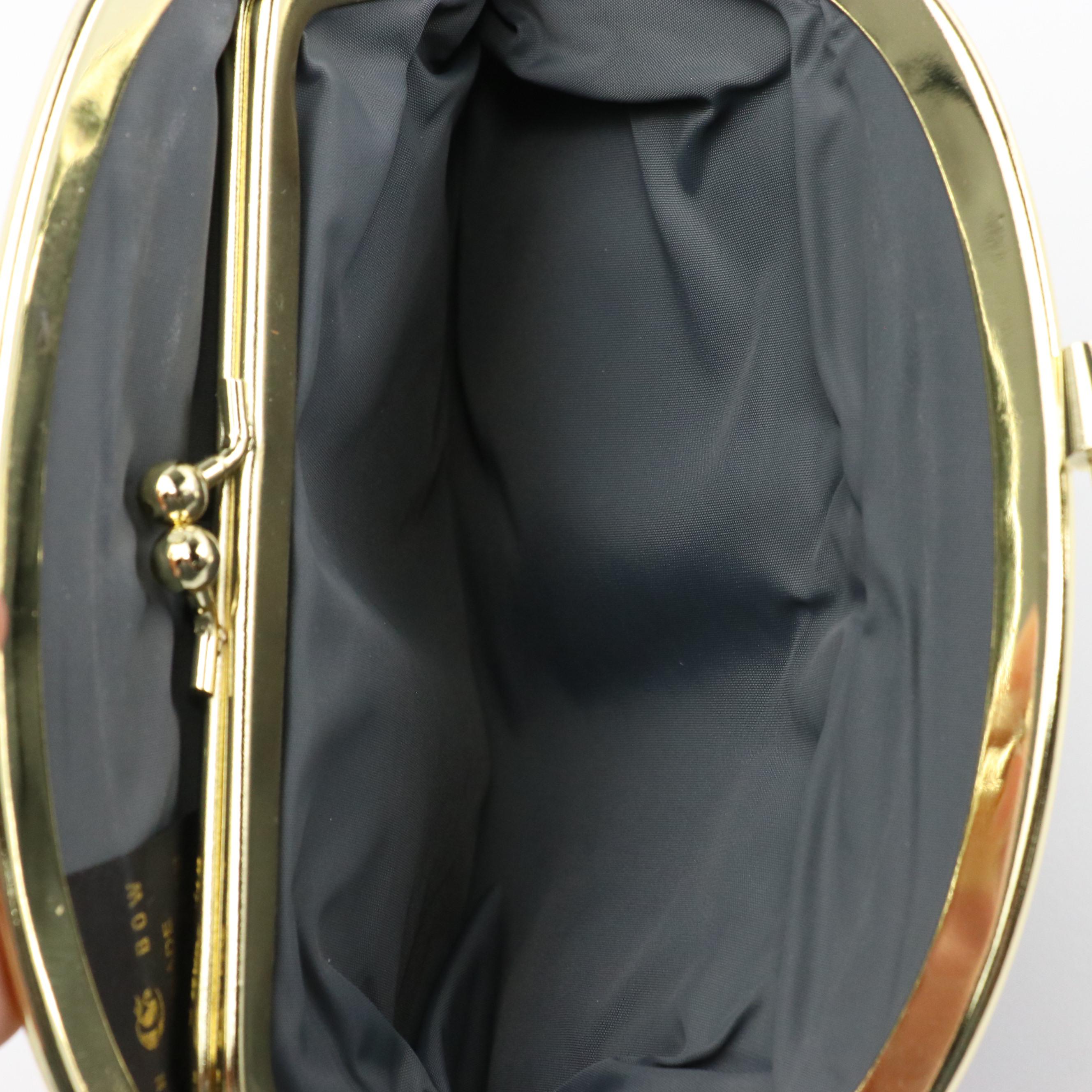 Eel Skin Kiss Lock Clutch and Shoulder Bag