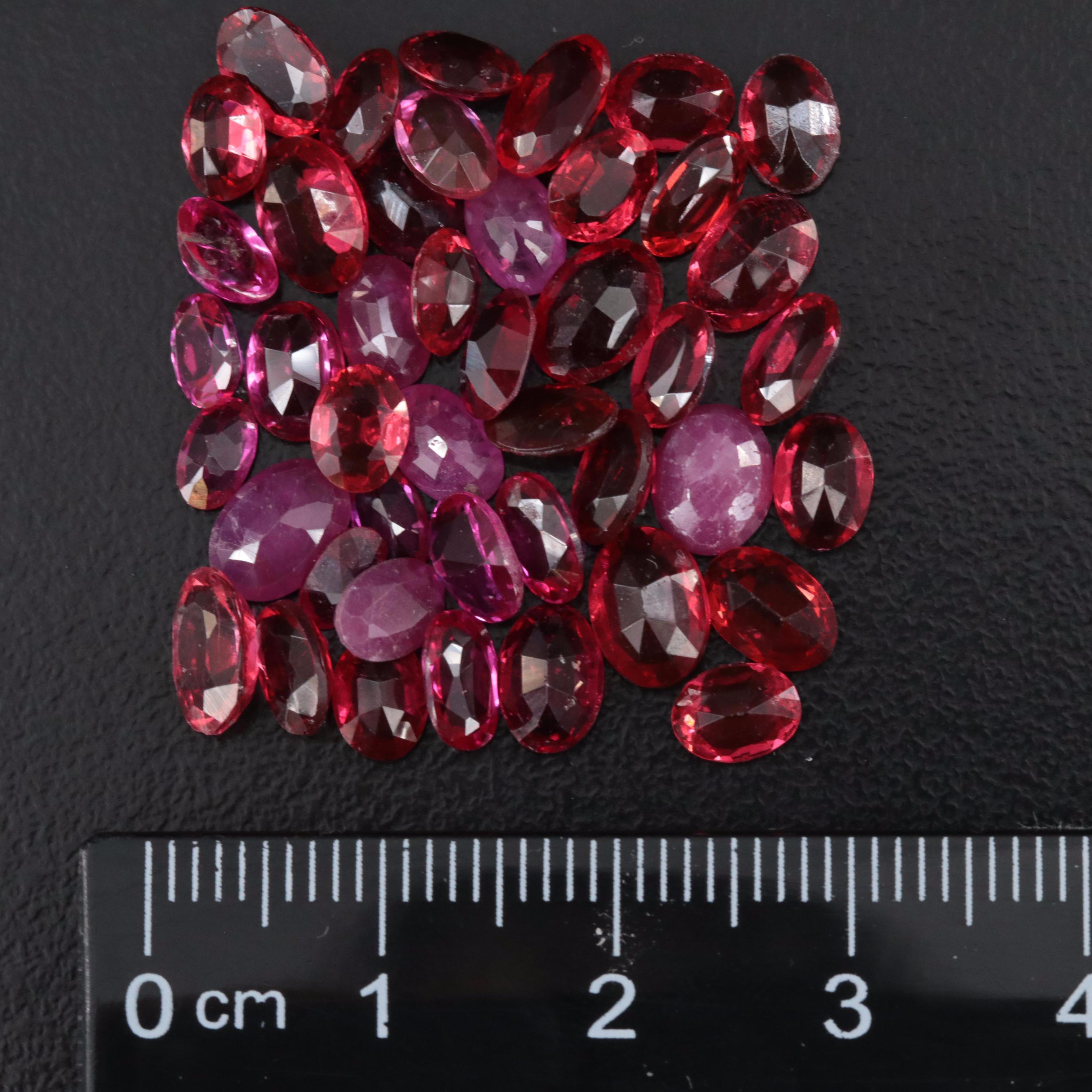 Loose 26.83 CTW Tourmaline, Ruby, Glass, and Gemstone Lot