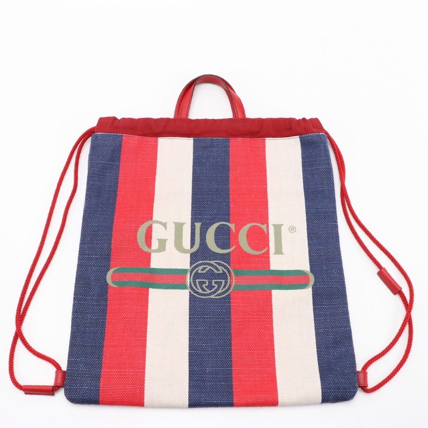 Gucci Logo Drawstring Backpack in Bi-Colored Sylvie Stripe Canvas