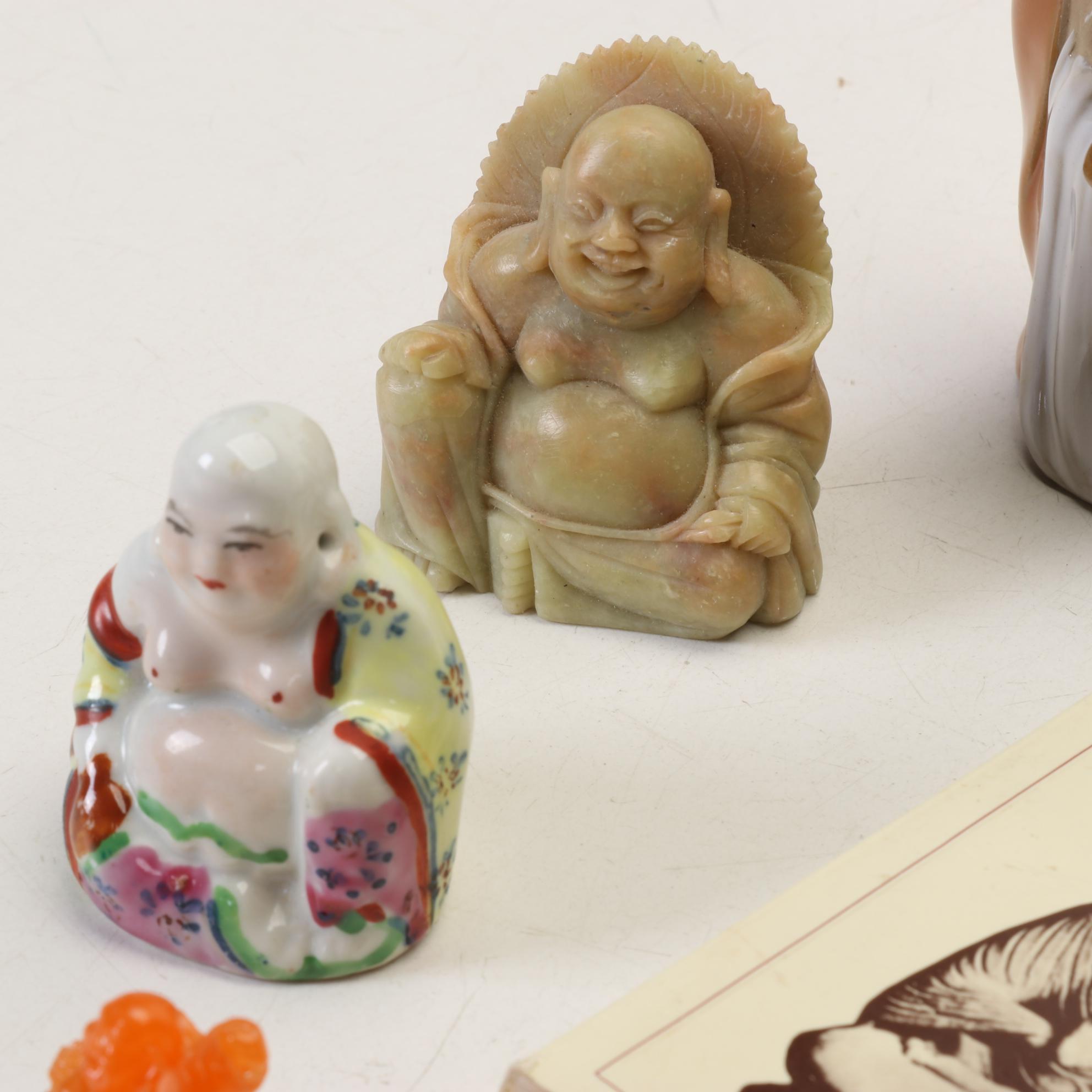 Buddha Collection Features Orange to Green Acrylic Laughing Buddhas and More
