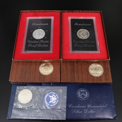 Eight Eisenhower Silver Dollars, Proof and Uncirculated