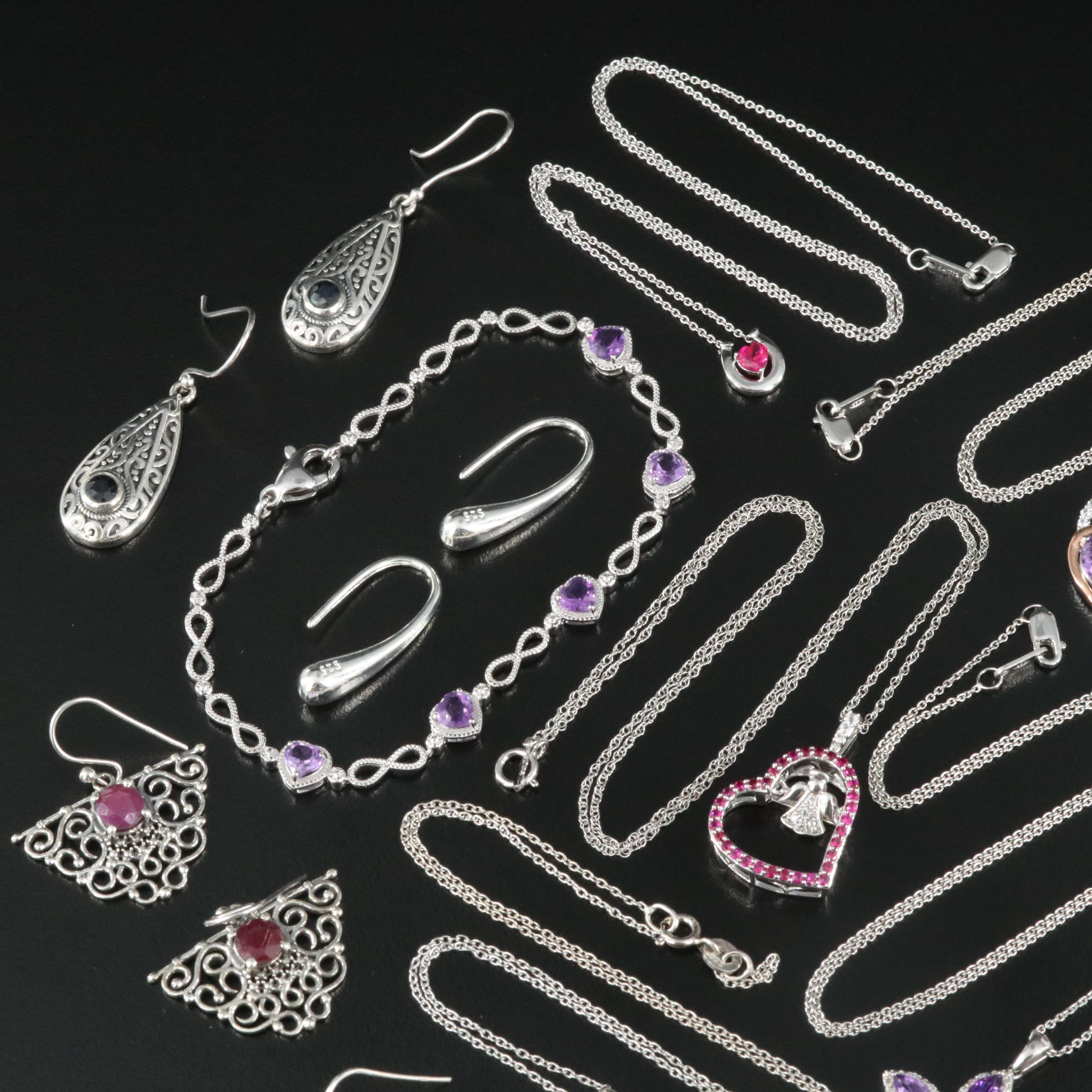 Sterling Gemstone Assortment Including Ruby and Amethyst