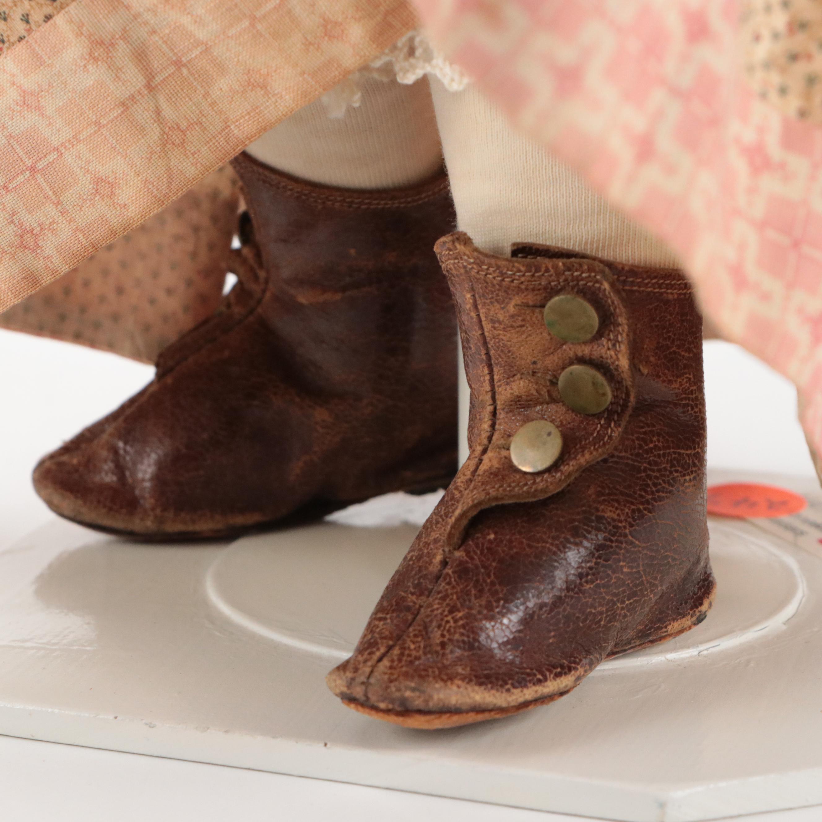 German Queen Victoria China Head Doll with Kid Leather Body, Mid-19th Century