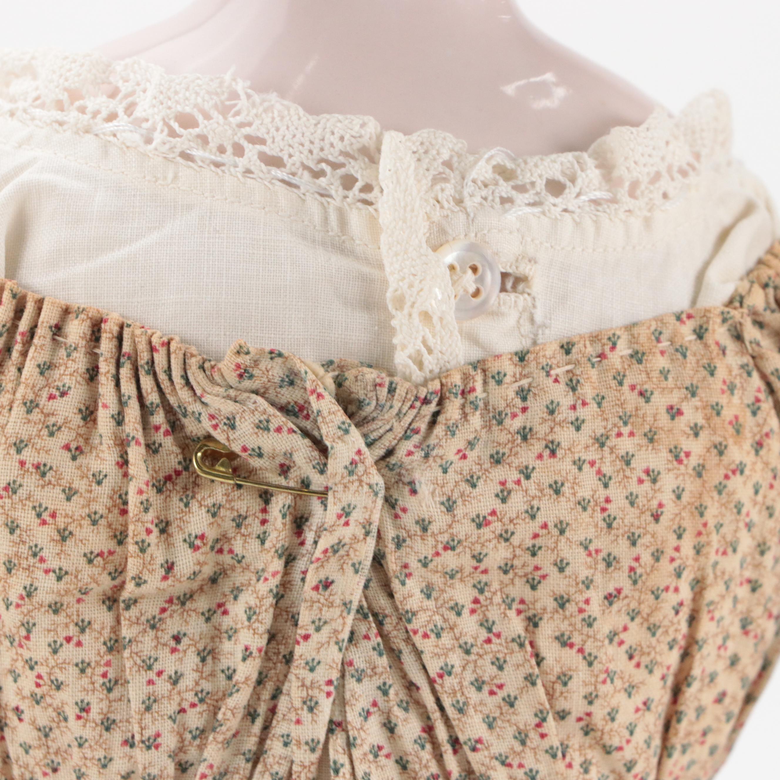 German Queen Victoria China Head Doll with Kid Leather Body, Mid-19th Century