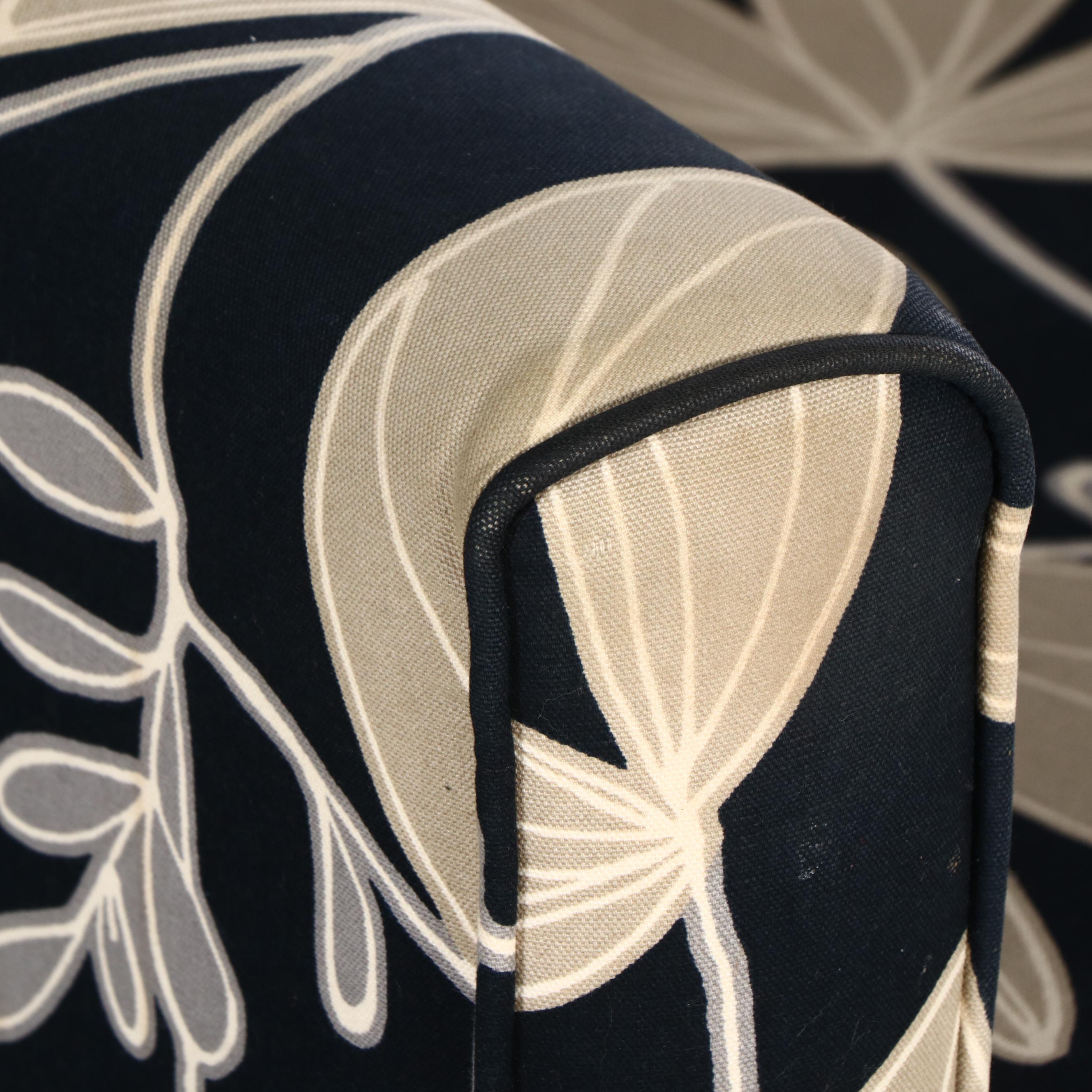 Black and Cream Floral Fabric Upholstered Armchair and Ottoman