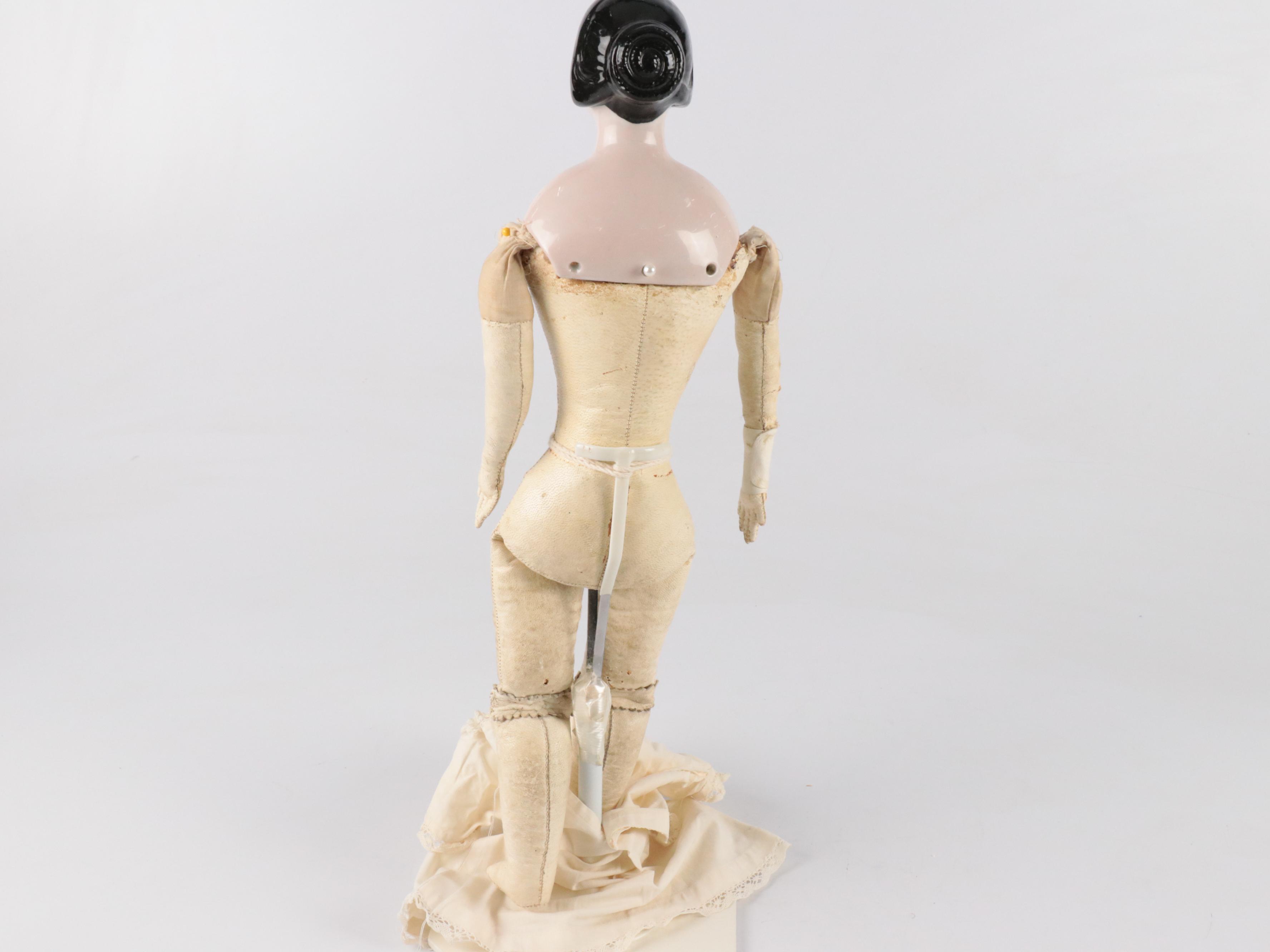 German Queen Victoria China Head Doll with Kid Leather Body, Mid-19th Century