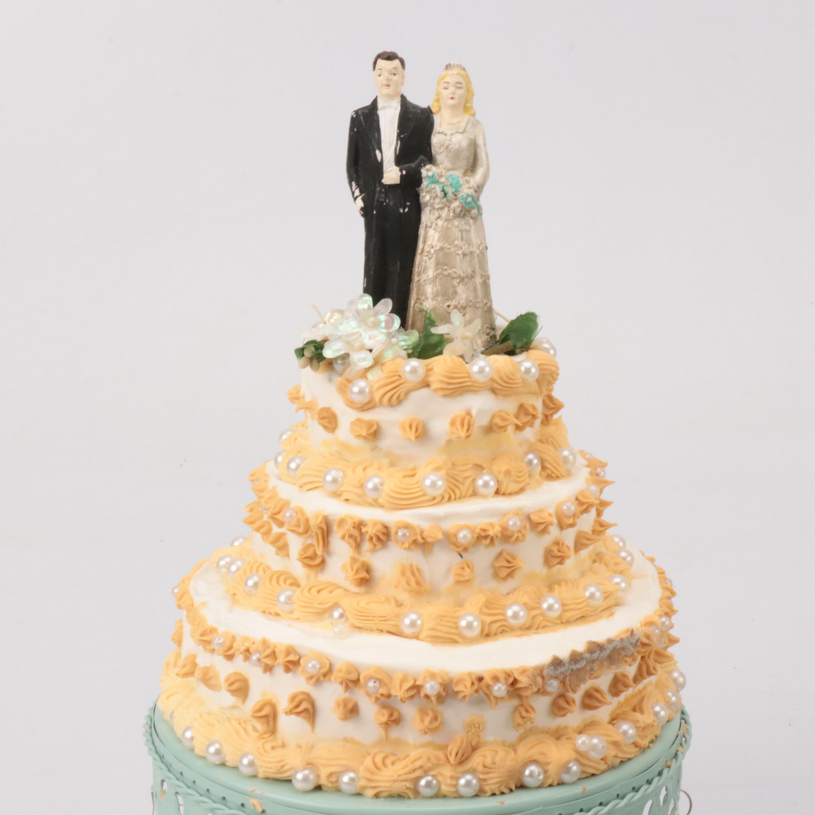 Plastic Wedding Cake Toppers with Decorative Cakes on Stands