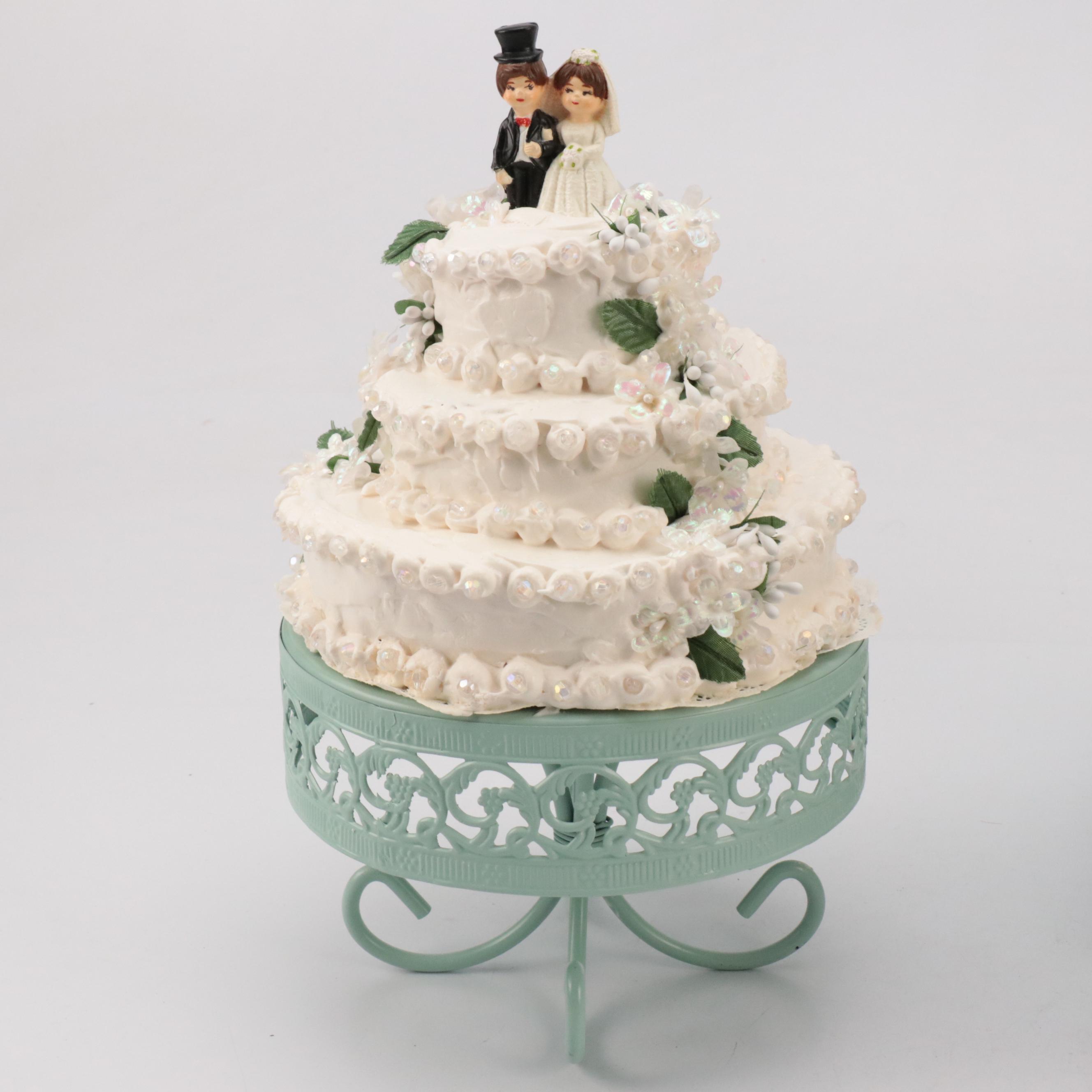 Plastic Wedding Cake Toppers with Decorative Cakes on Stands