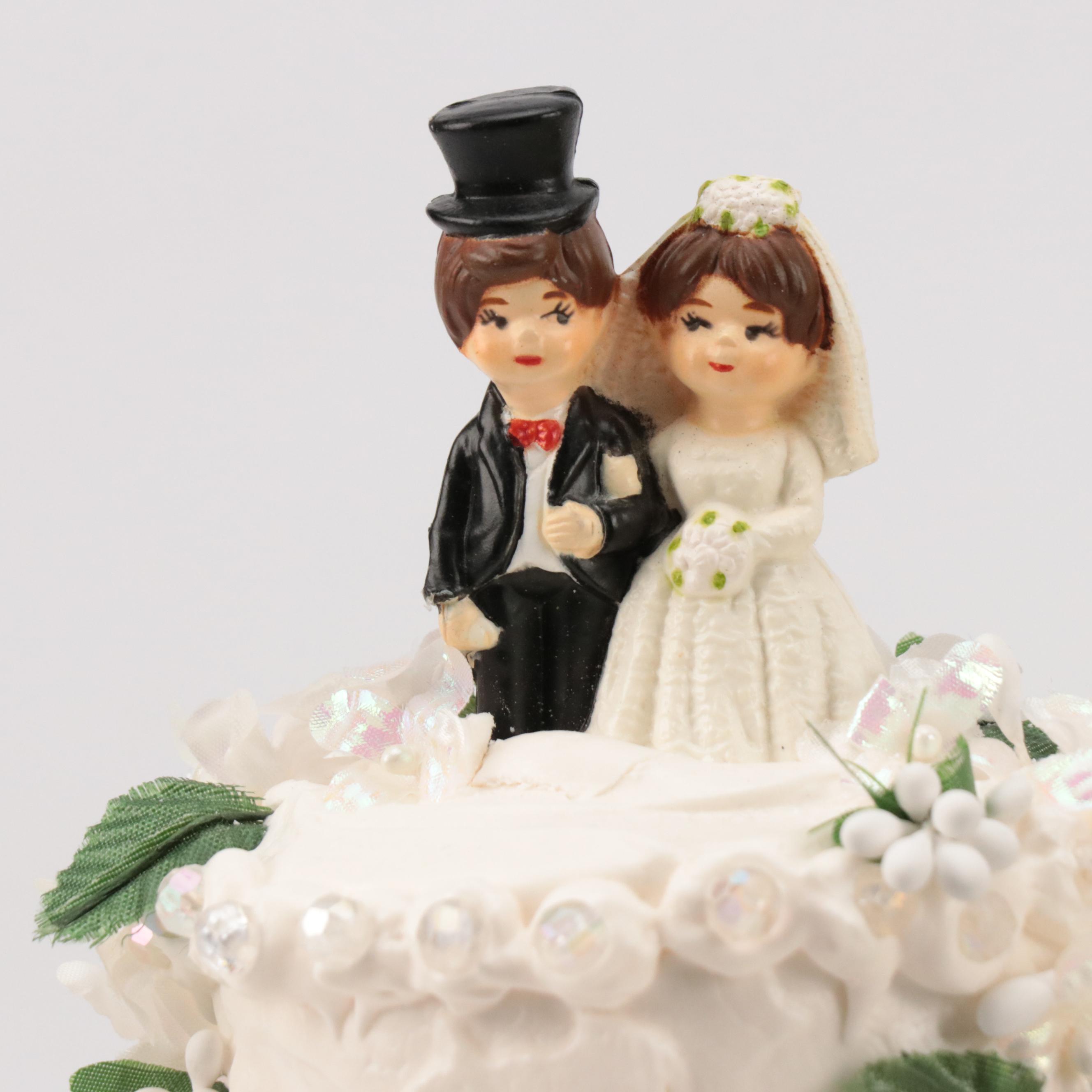 Plastic Wedding Cake Toppers with Decorative Cakes on Stands