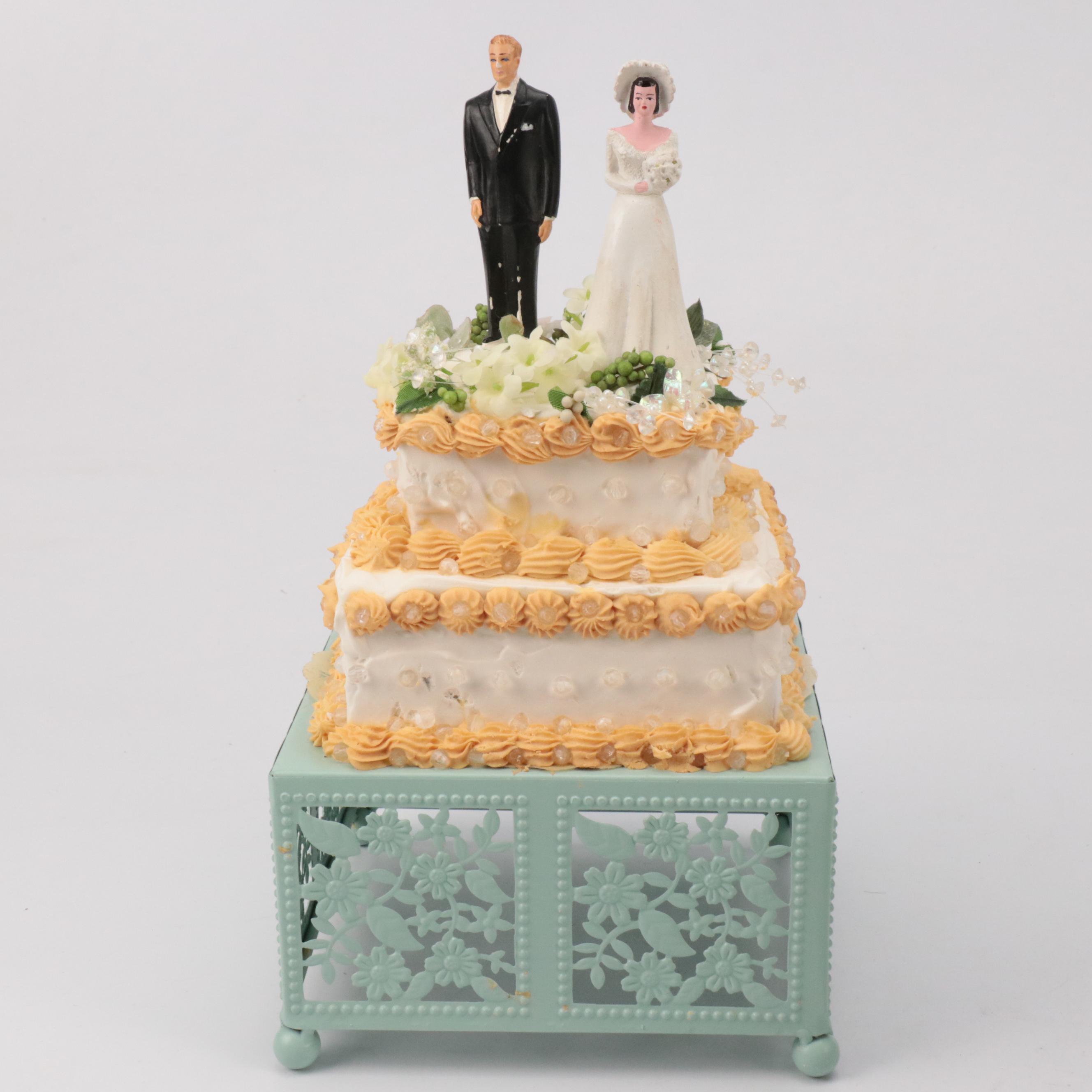 Plastic Wedding Cake Toppers with Decorative Cakes on Stands