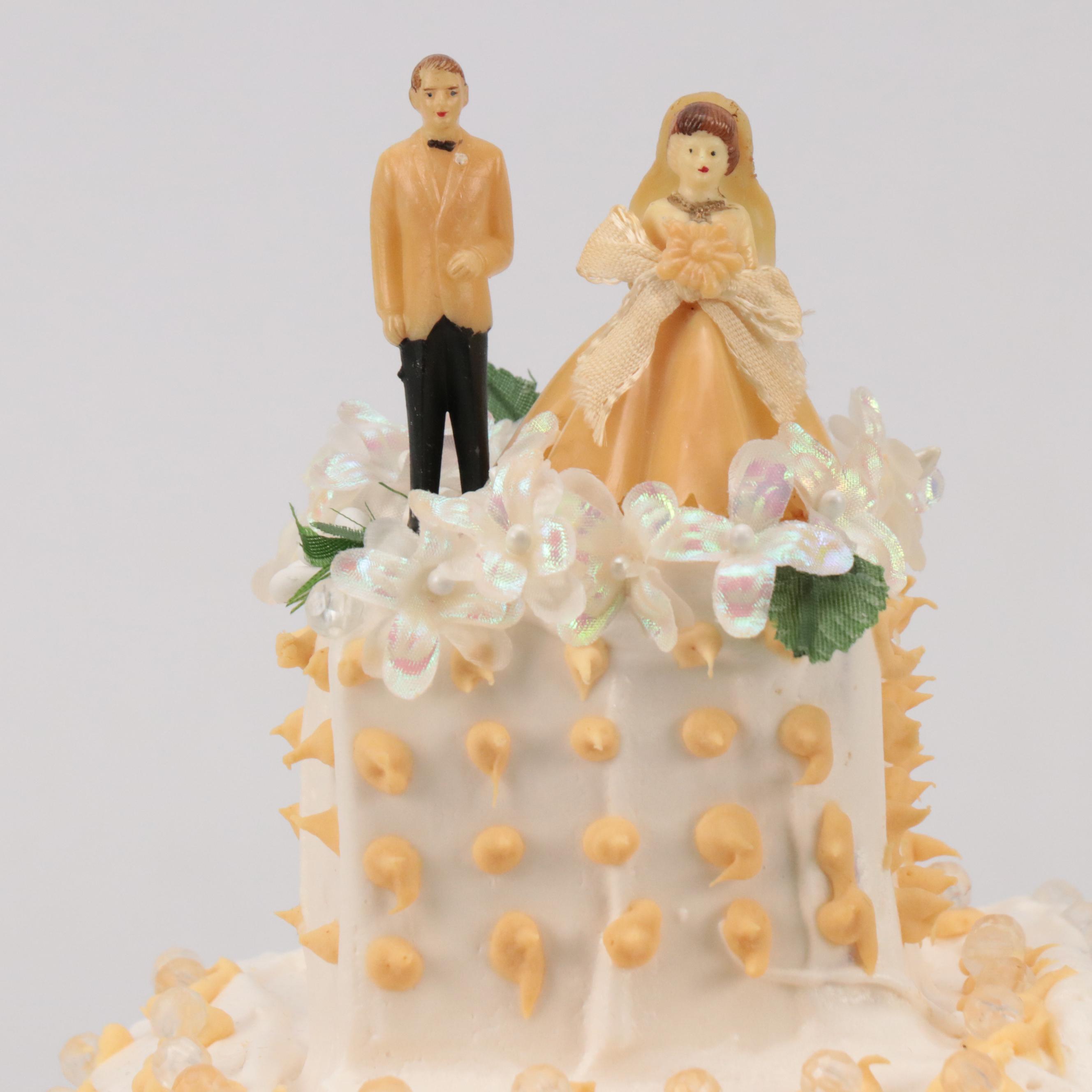Plastic Wedding Cake Toppers with Decorative Cakes on Stands