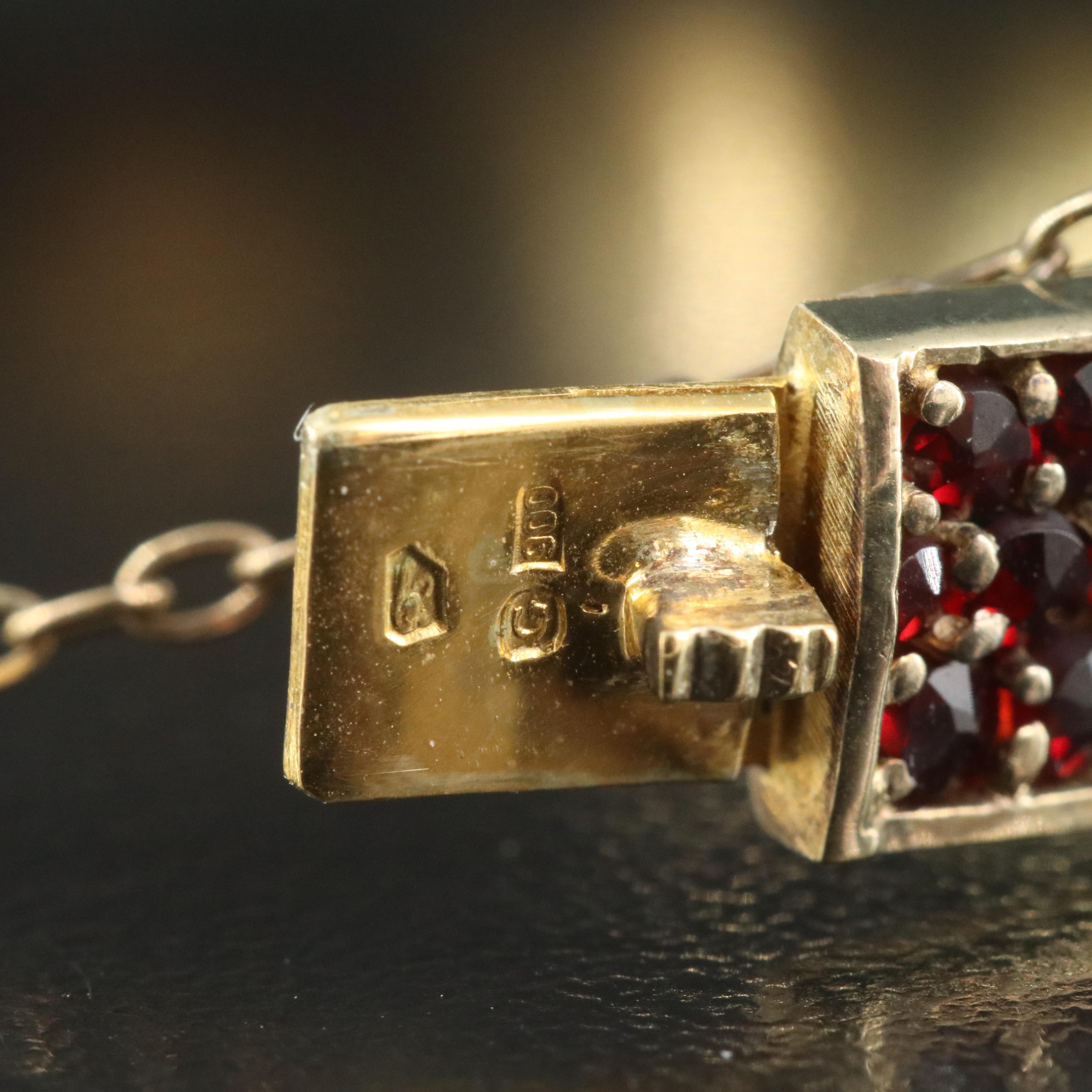 Collection of Vintage Garnet Jewelry Featuring French 900 Silver Bracelet