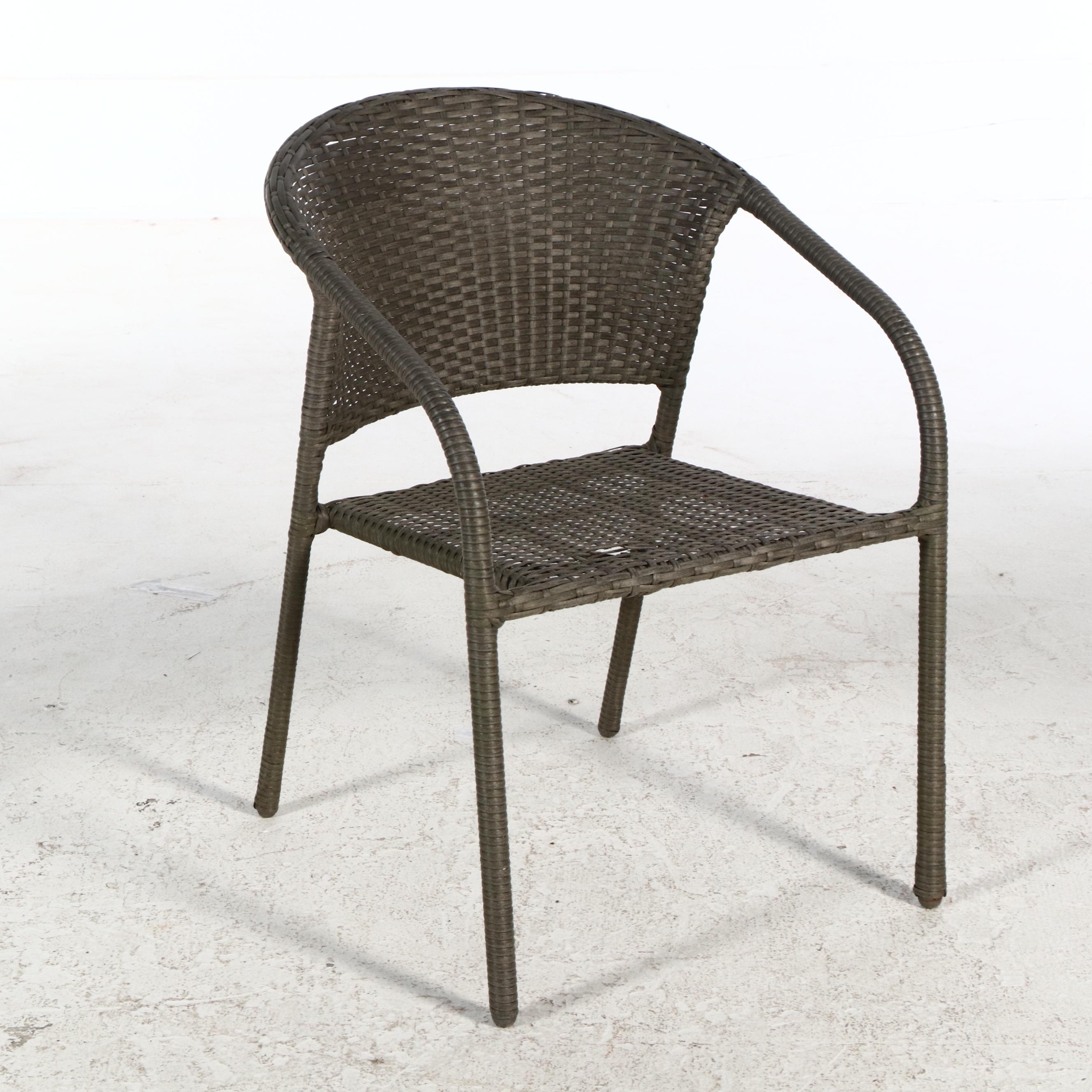 Four Contemporary Resin Wicker Patio Chairs