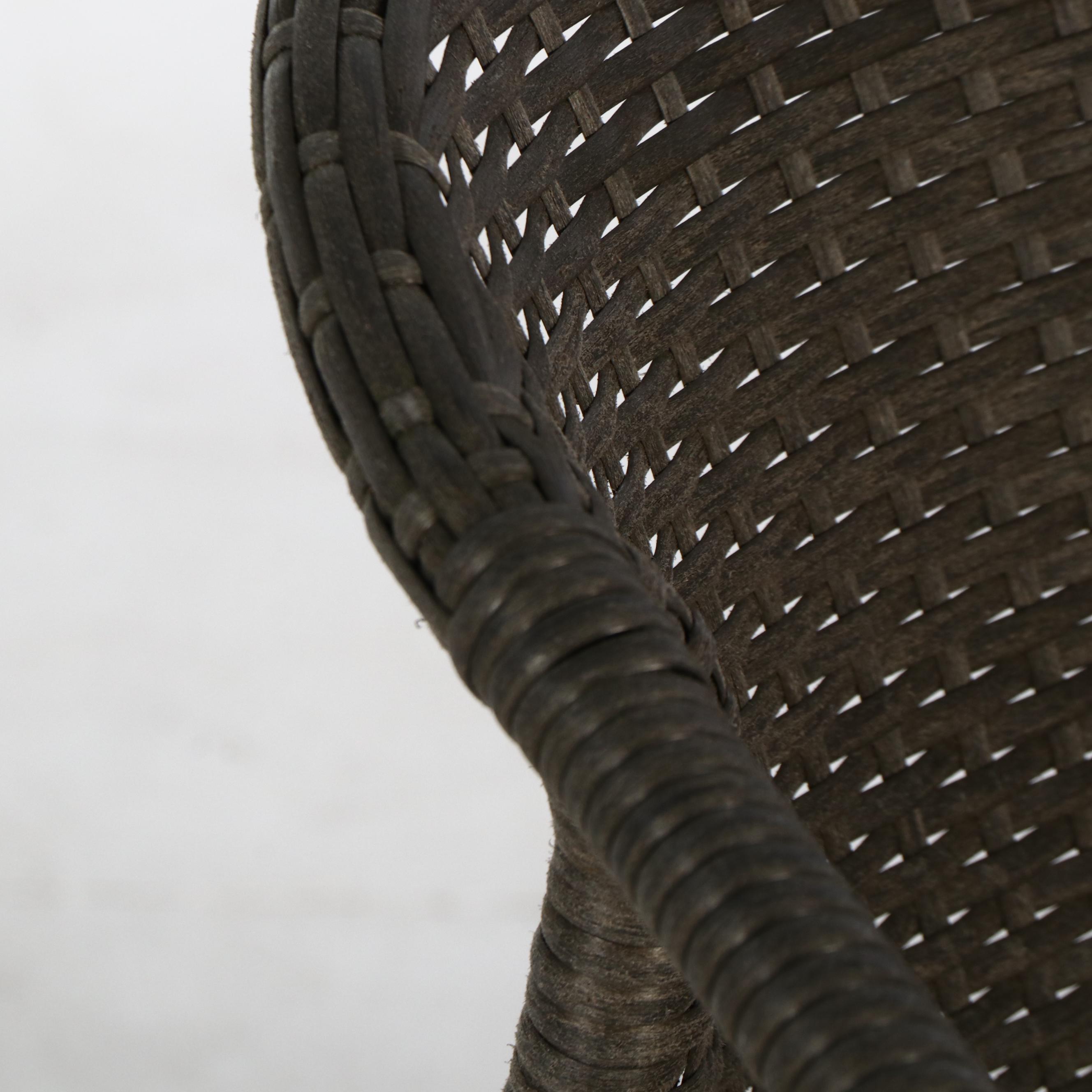 Four Contemporary Resin Wicker Patio Chairs