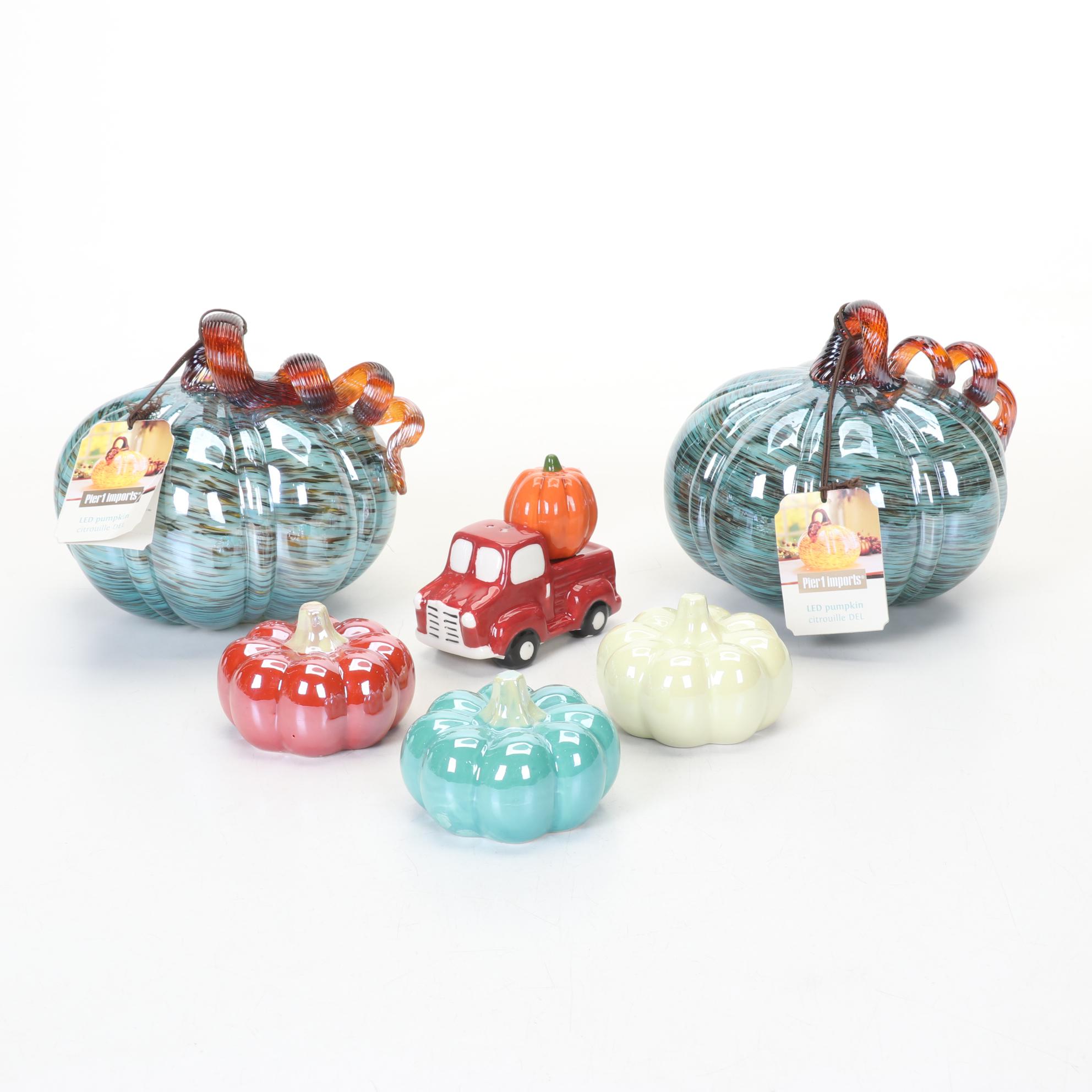Pair of Pier 1 LED Lighted Glass Pumpkins with Ceramic Pumpkins