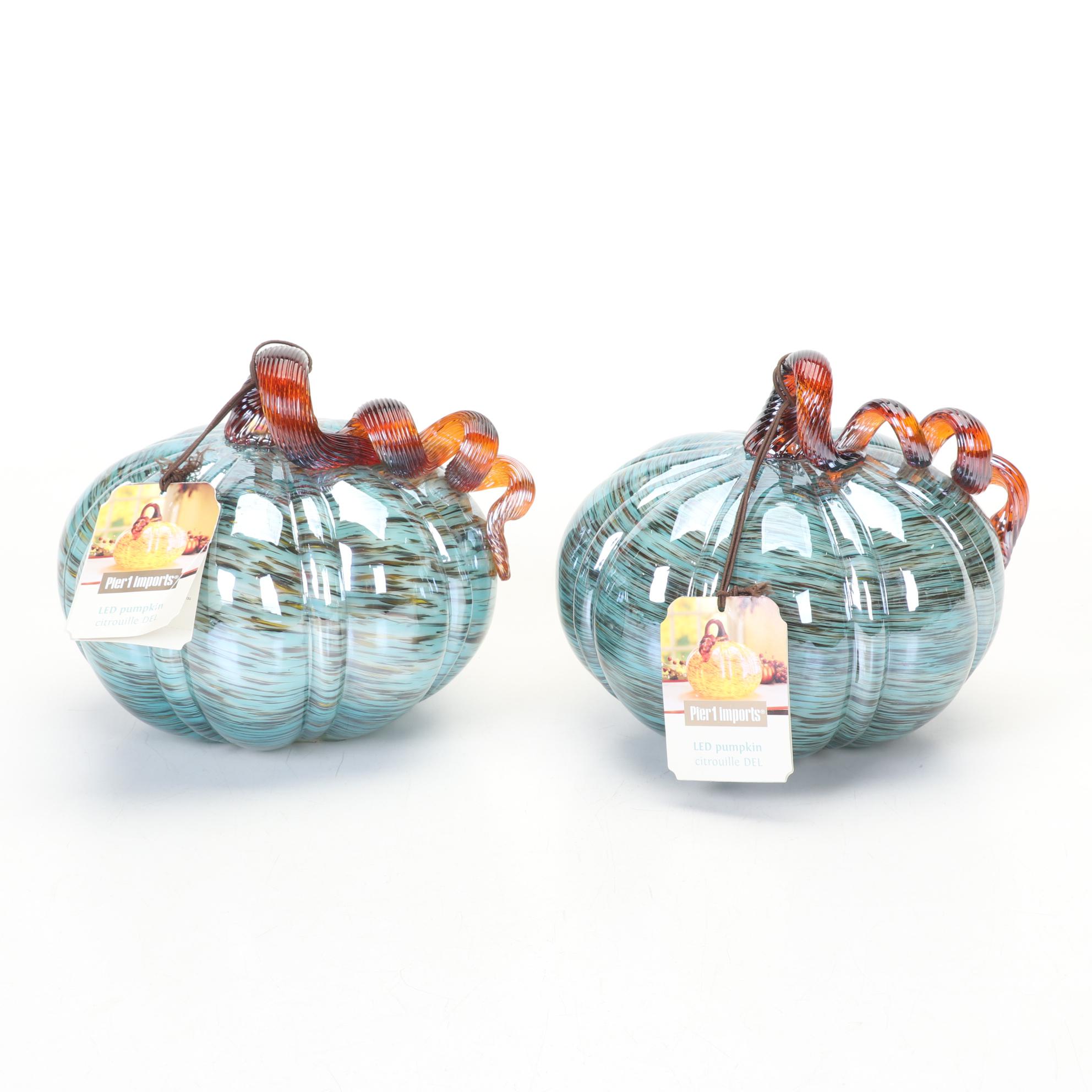 Pair of Pier 1 LED Lighted Glass Pumpkins with Ceramic Pumpkins