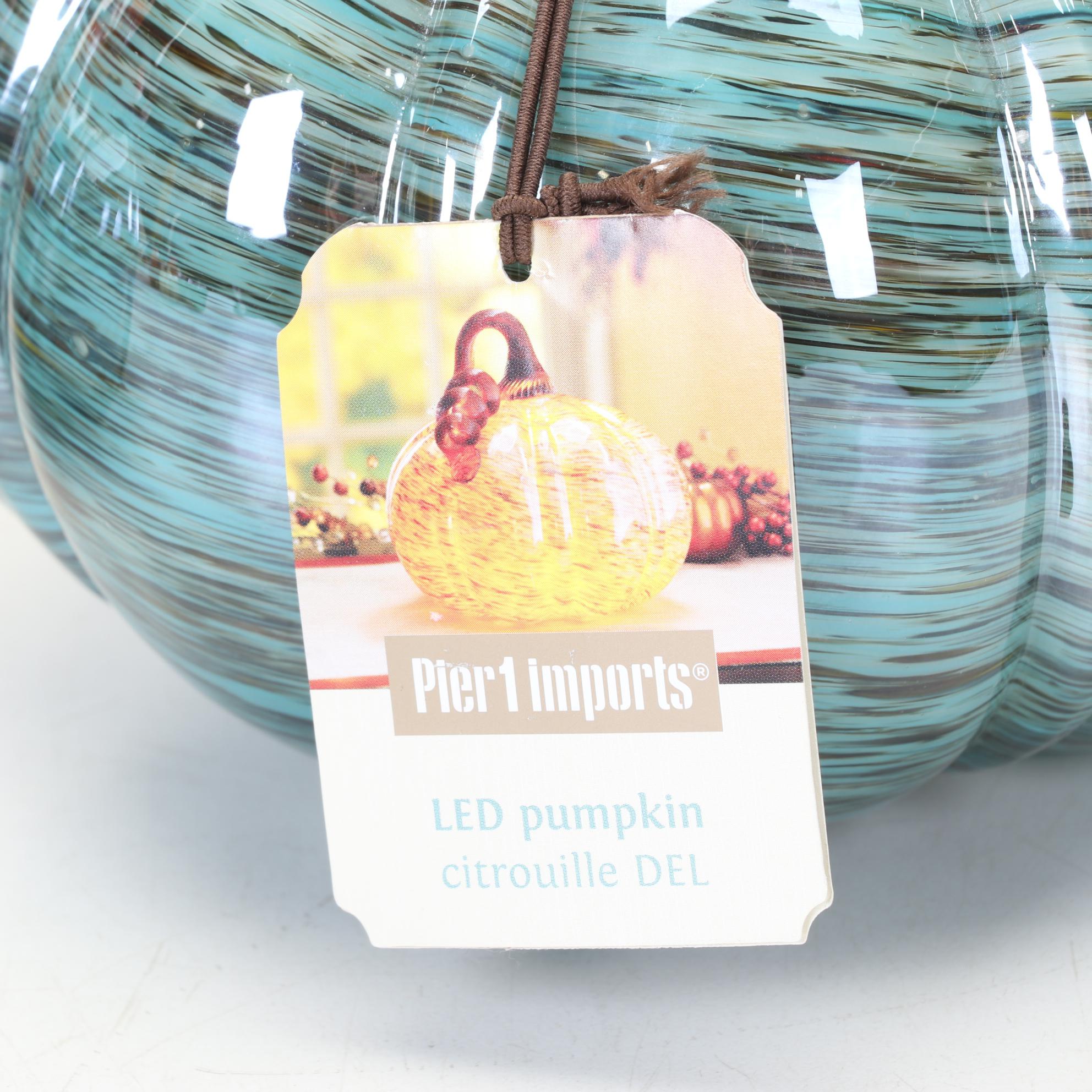 Pair of Pier 1 LED Lighted Glass Pumpkins with Ceramic Pumpkins