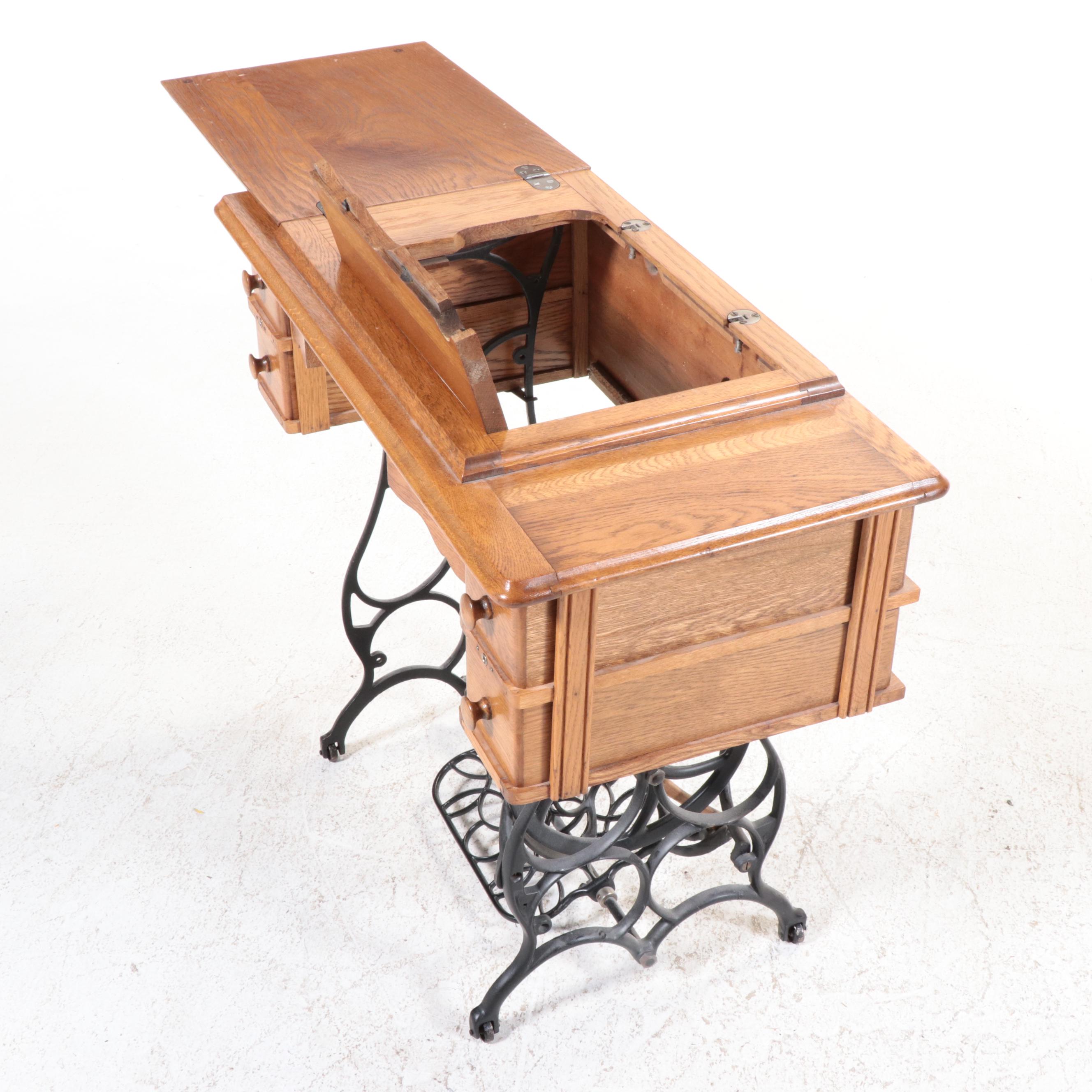 Oak and Iron Treadle Base Sewing Machine Cabinet, Early 20th Century
