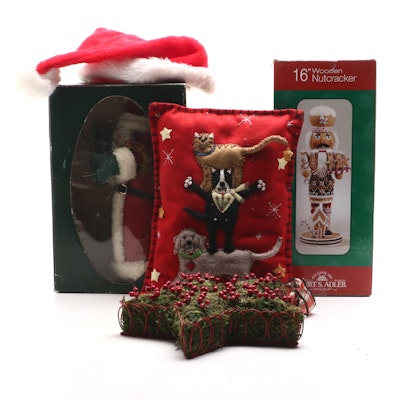 Christmas Décor Featuring Santa Figure, Wooden Nutcracker, and More