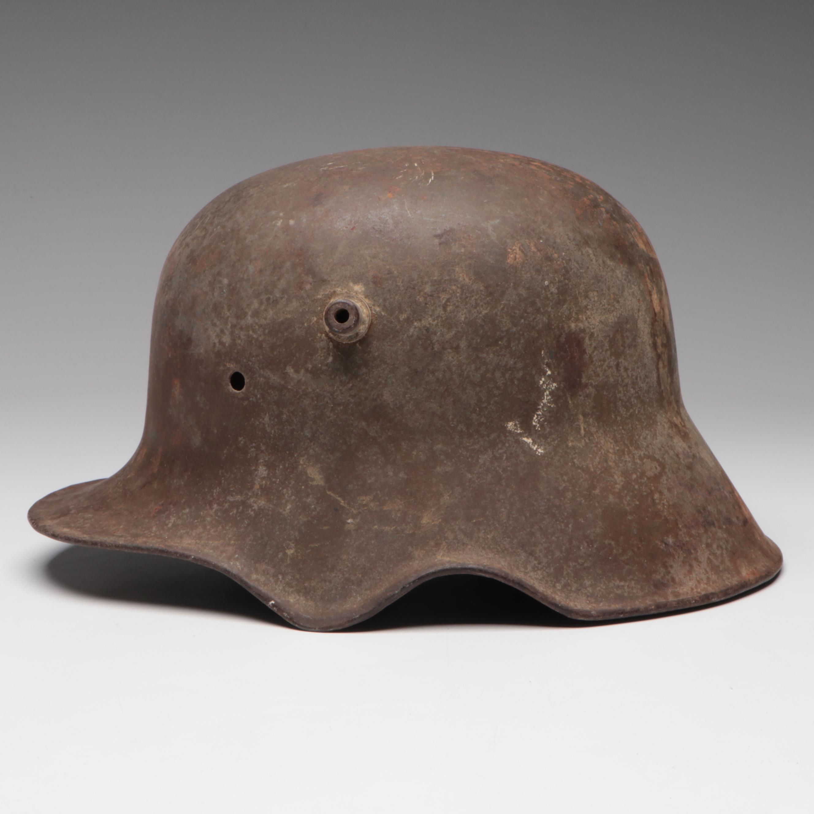 WWI German M18 Cavalry Helmet and WWI French M1915 Adrian Helmet