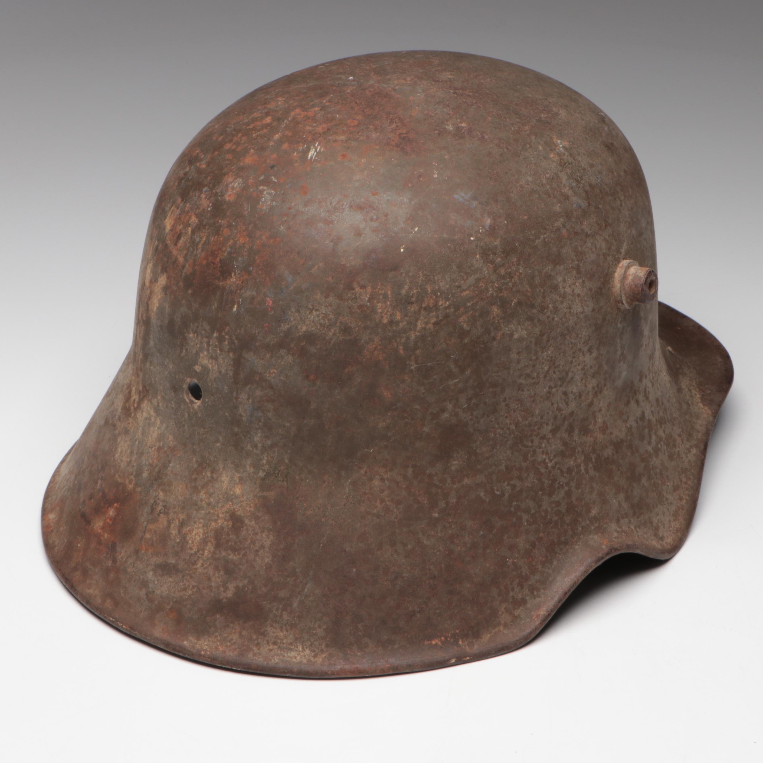 WWI German M18 Cavalry Helmet and WWI French M1915 Adrian Helmet