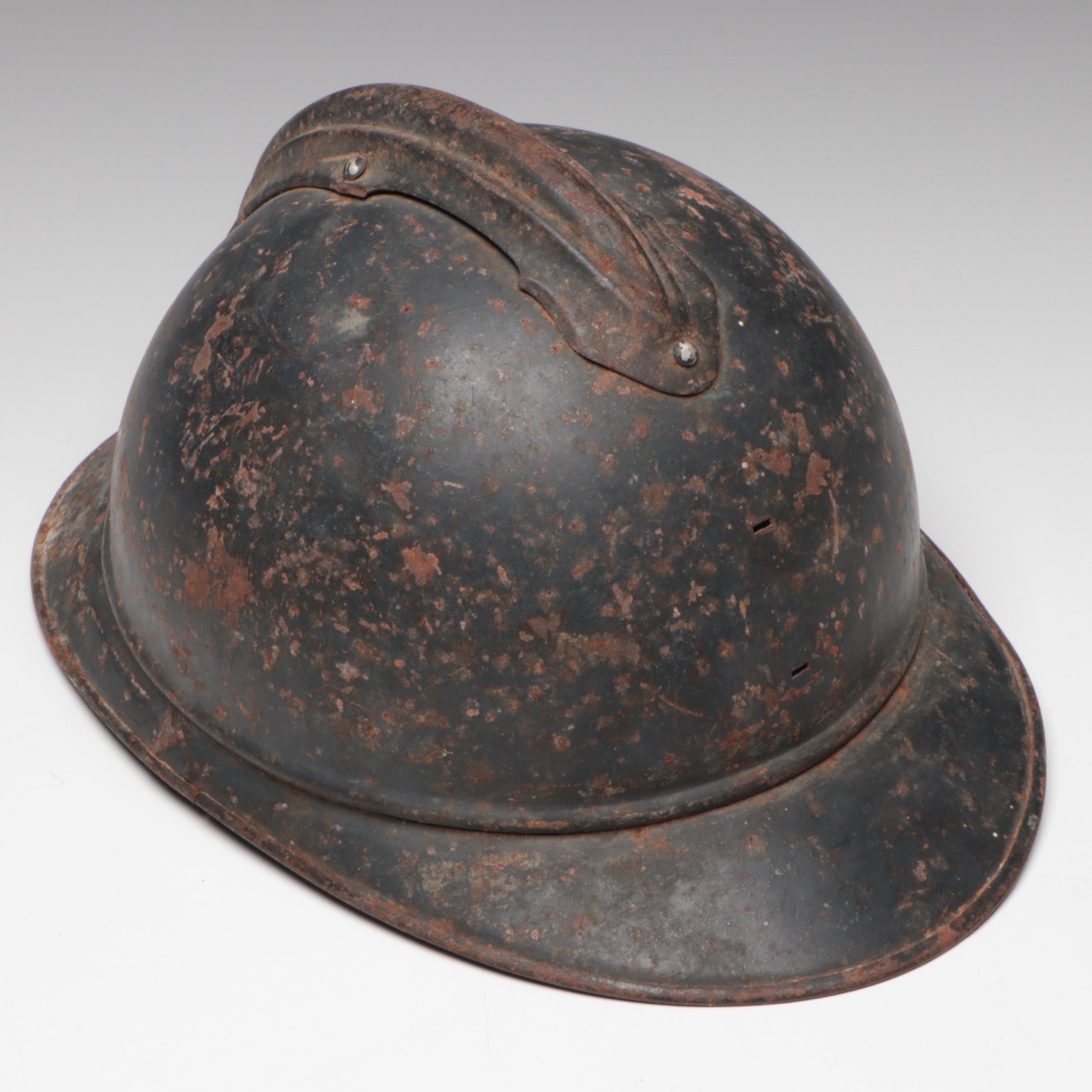 WWI German M18 Cavalry Helmet and WWI French M1915 Adrian Helmet