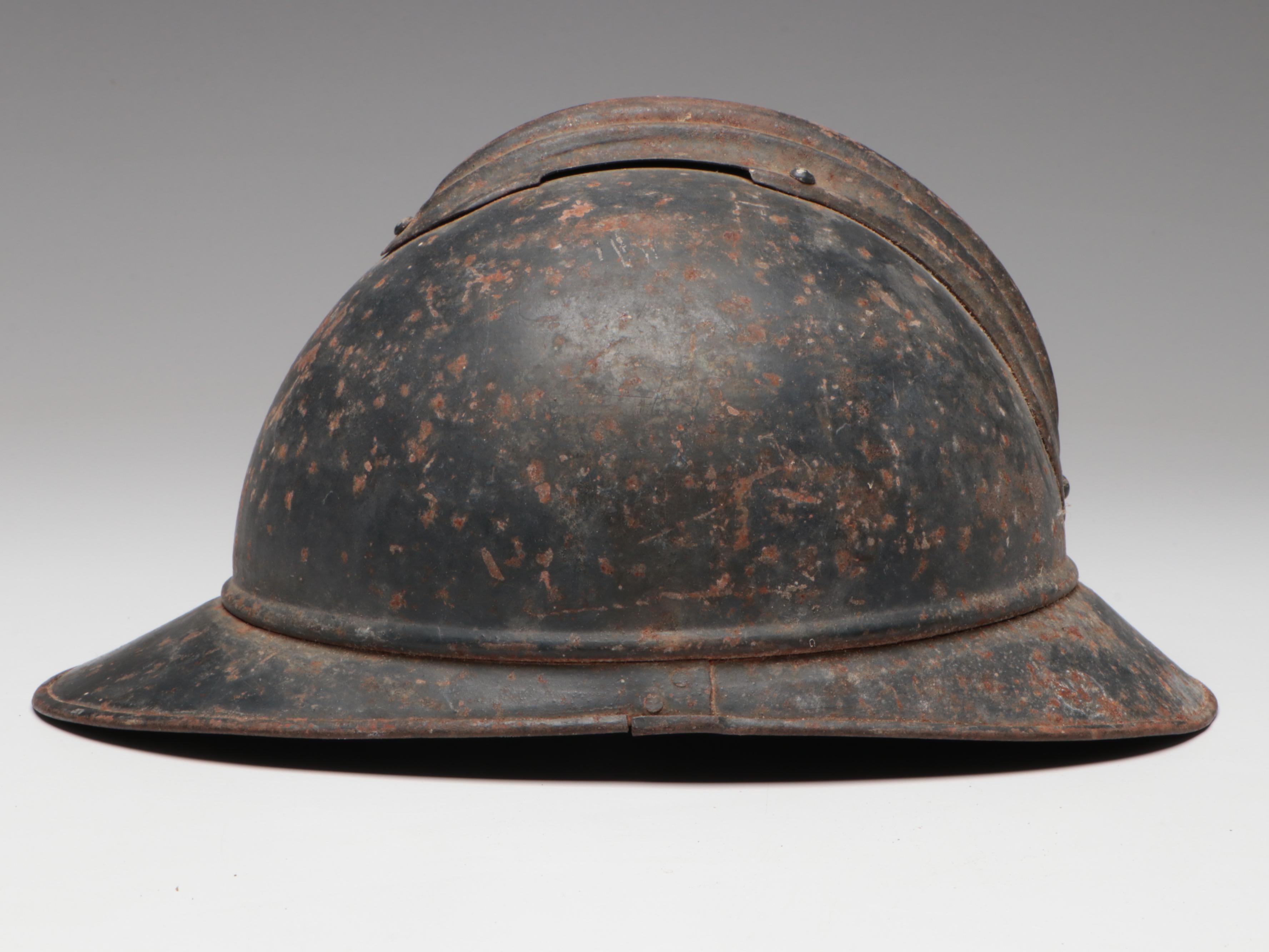 WWI German M18 Cavalry Helmet and WWI French M1915 Adrian Helmet