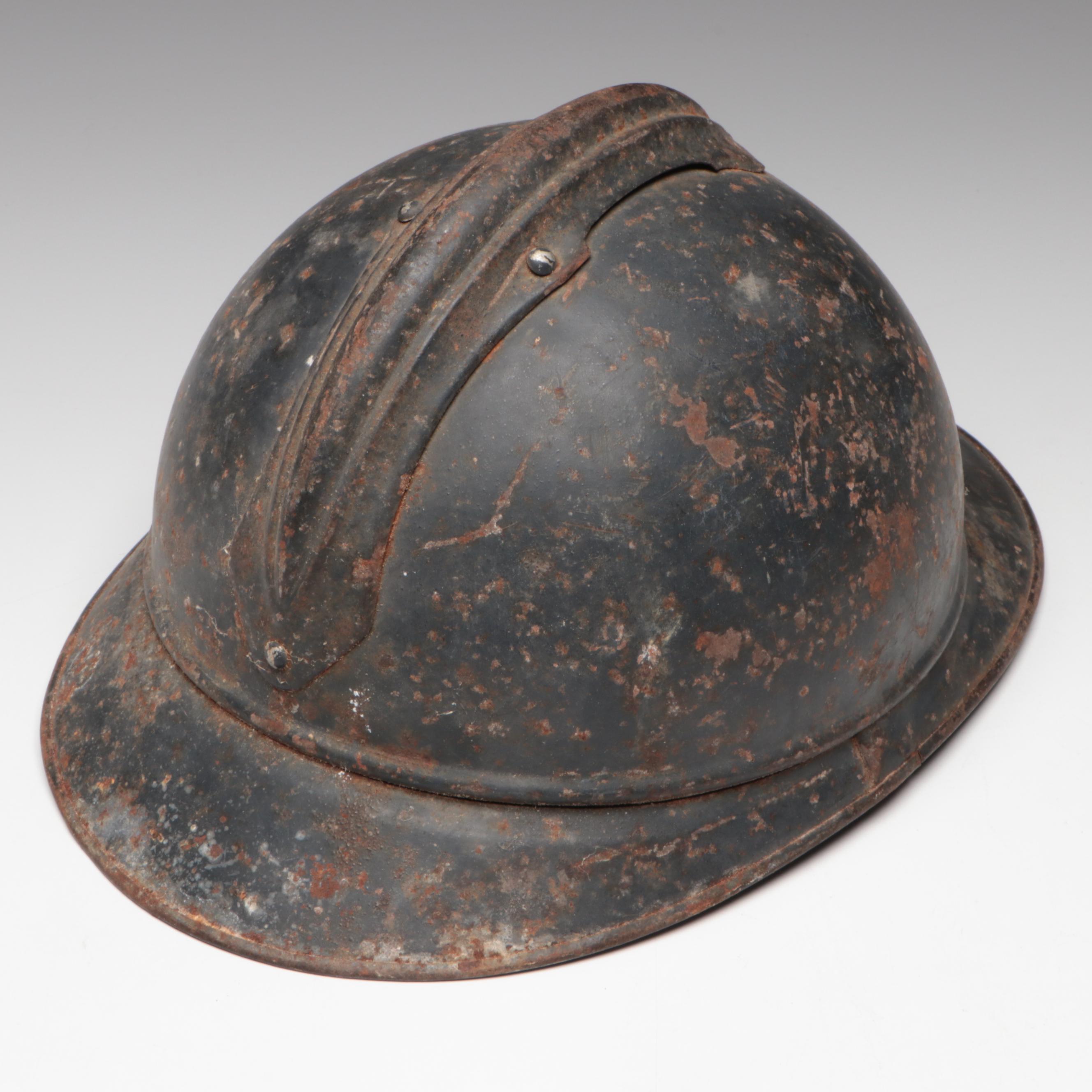 WWI German M18 Cavalry Helmet and WWI French M1915 Adrian Helmet