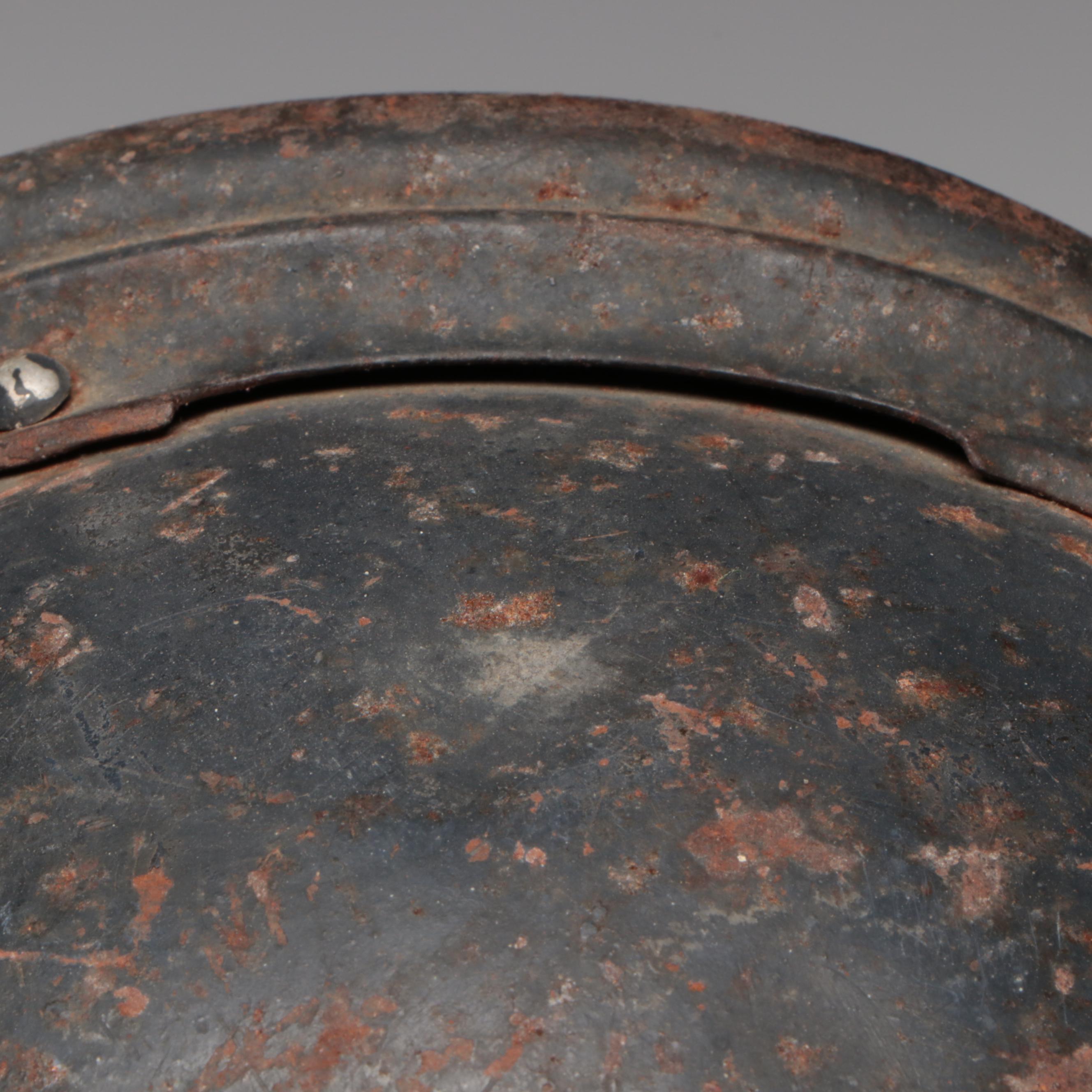 WWI German M18 Cavalry Helmet and WWI French M1915 Adrian Helmet