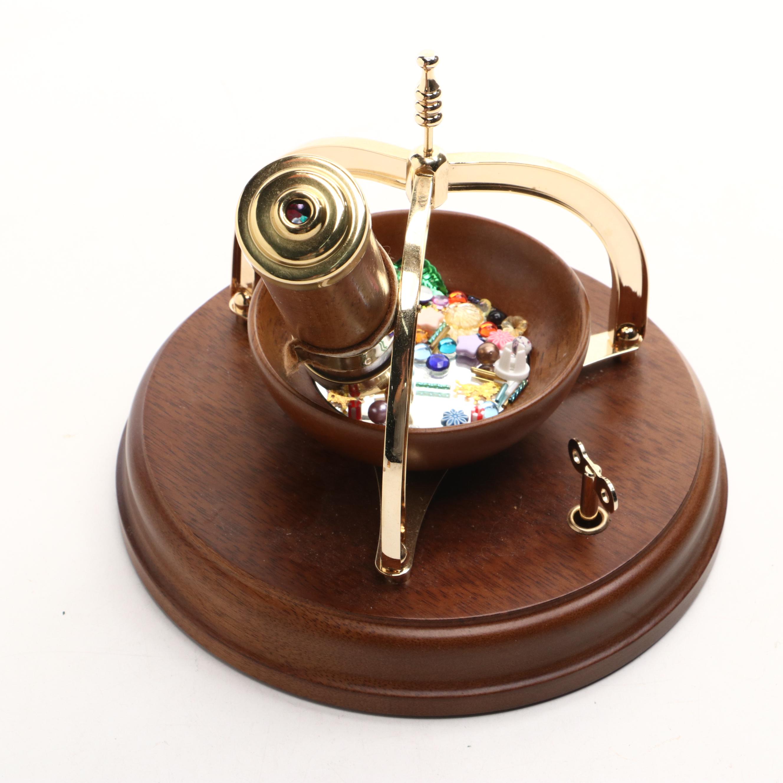 Nellie Bly Lacquered Brass, Glass and Wood Wind Up Kaleidoscope Music Box
