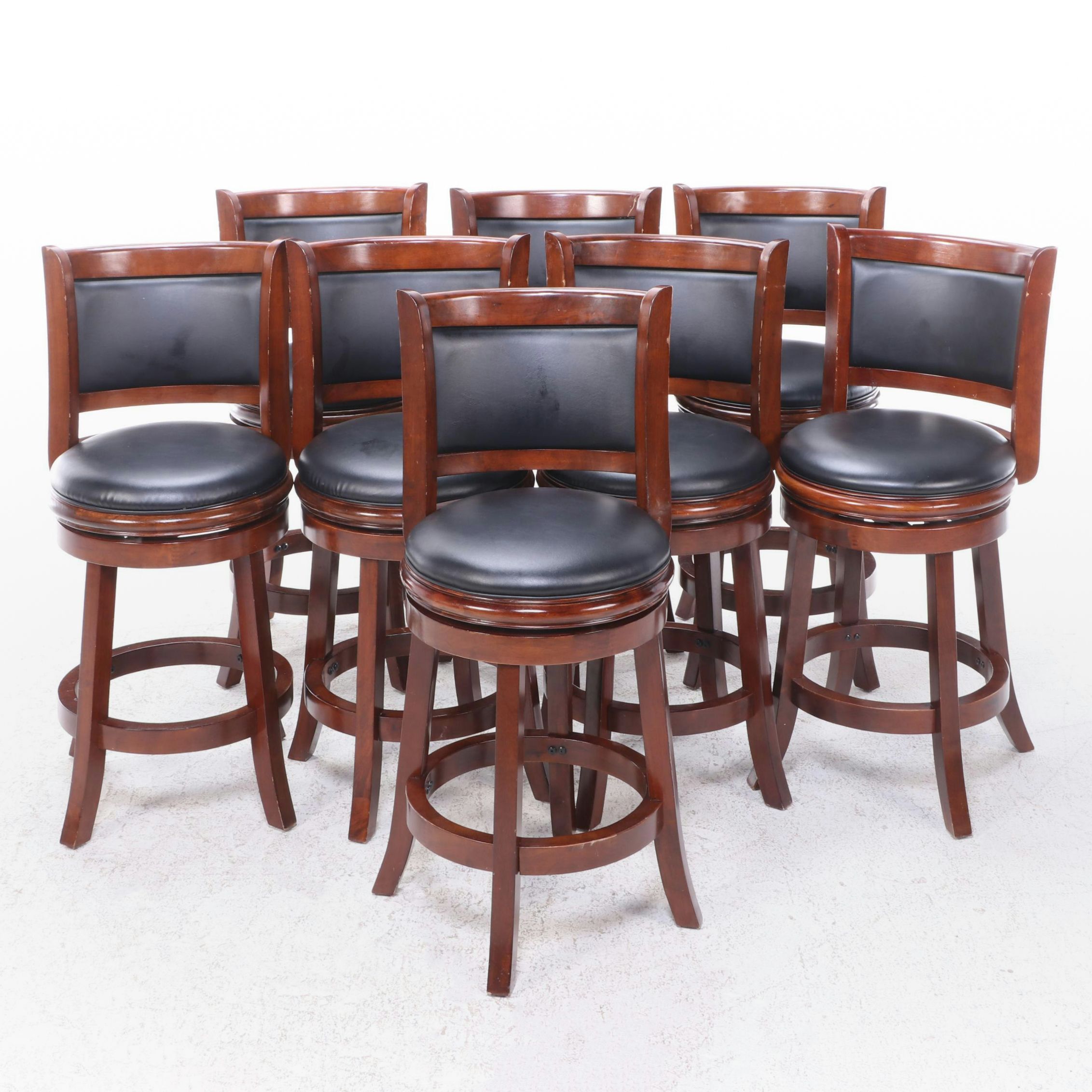 Eight Contemporary Hardwood and Faux Leather Swivel Seat Counter Stools