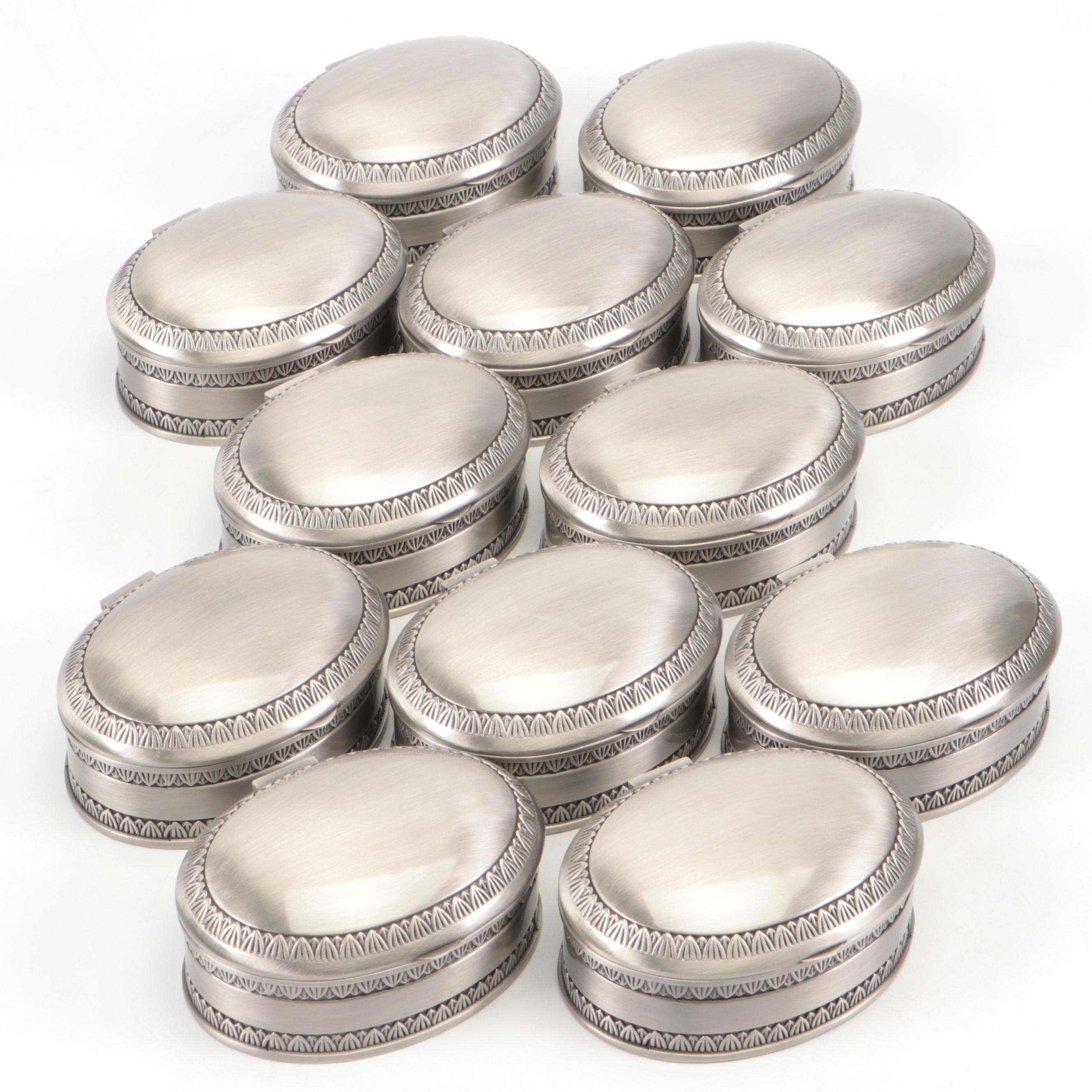 Twelve Fabric-Lined Metal Hinged Jewelry Boxes