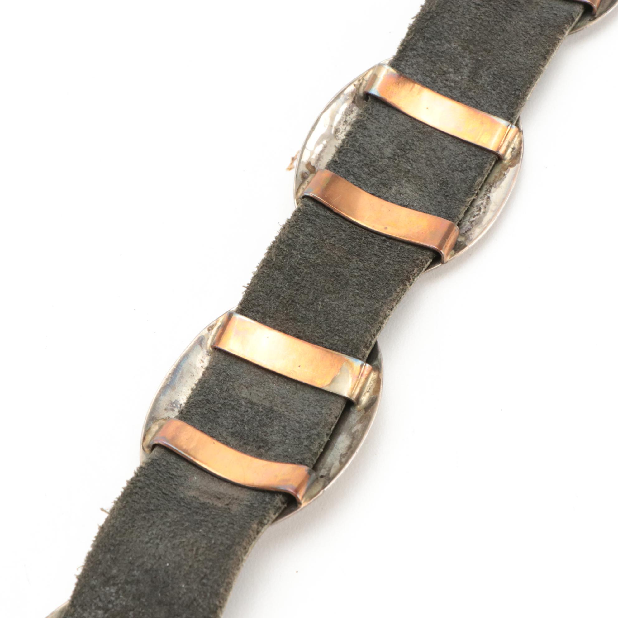 Southwestern Style Concho Belt in Stamped Metal and Black Leather