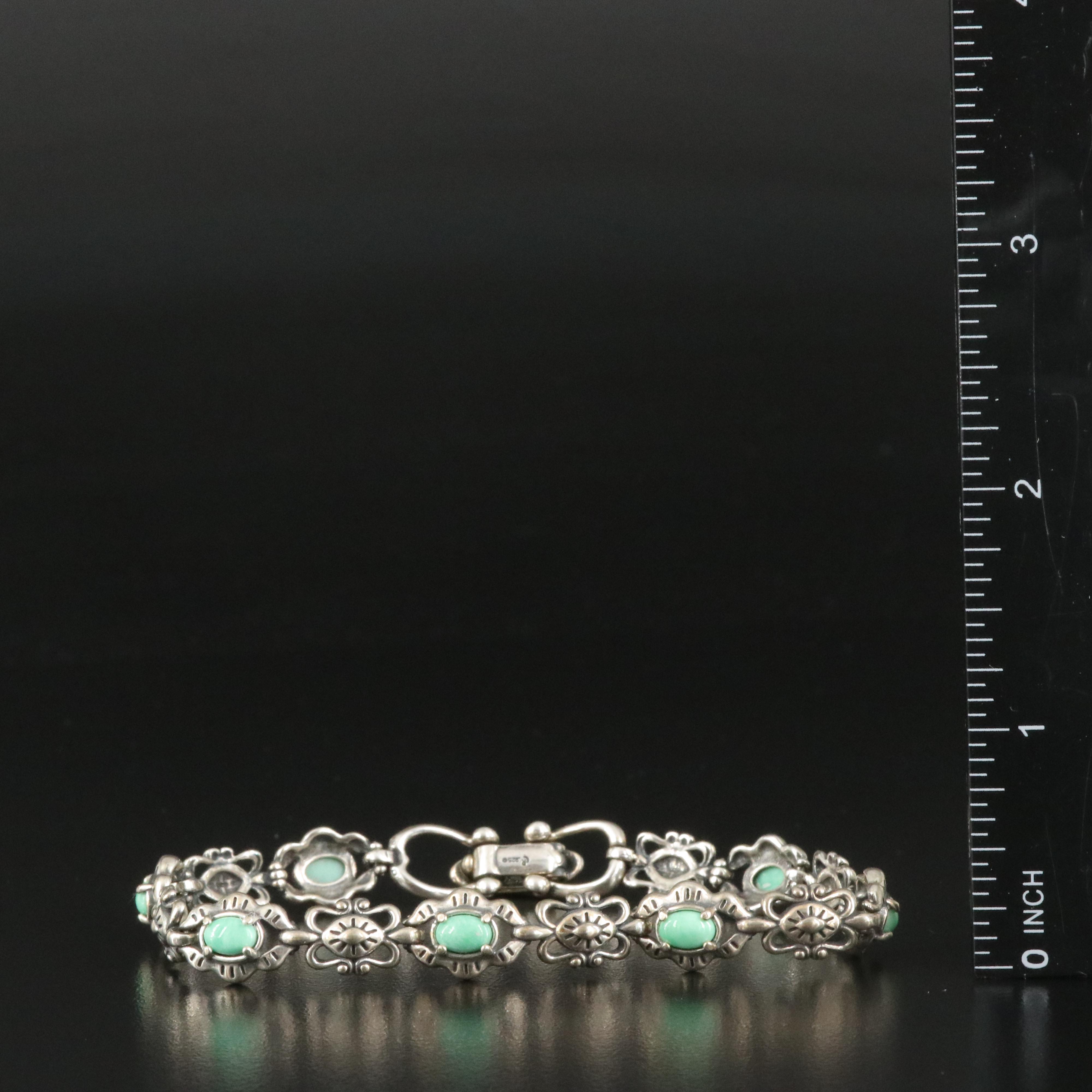 Sterling Bracelets and Earrings Including Mother of Pearl, Marcasite and Diamond