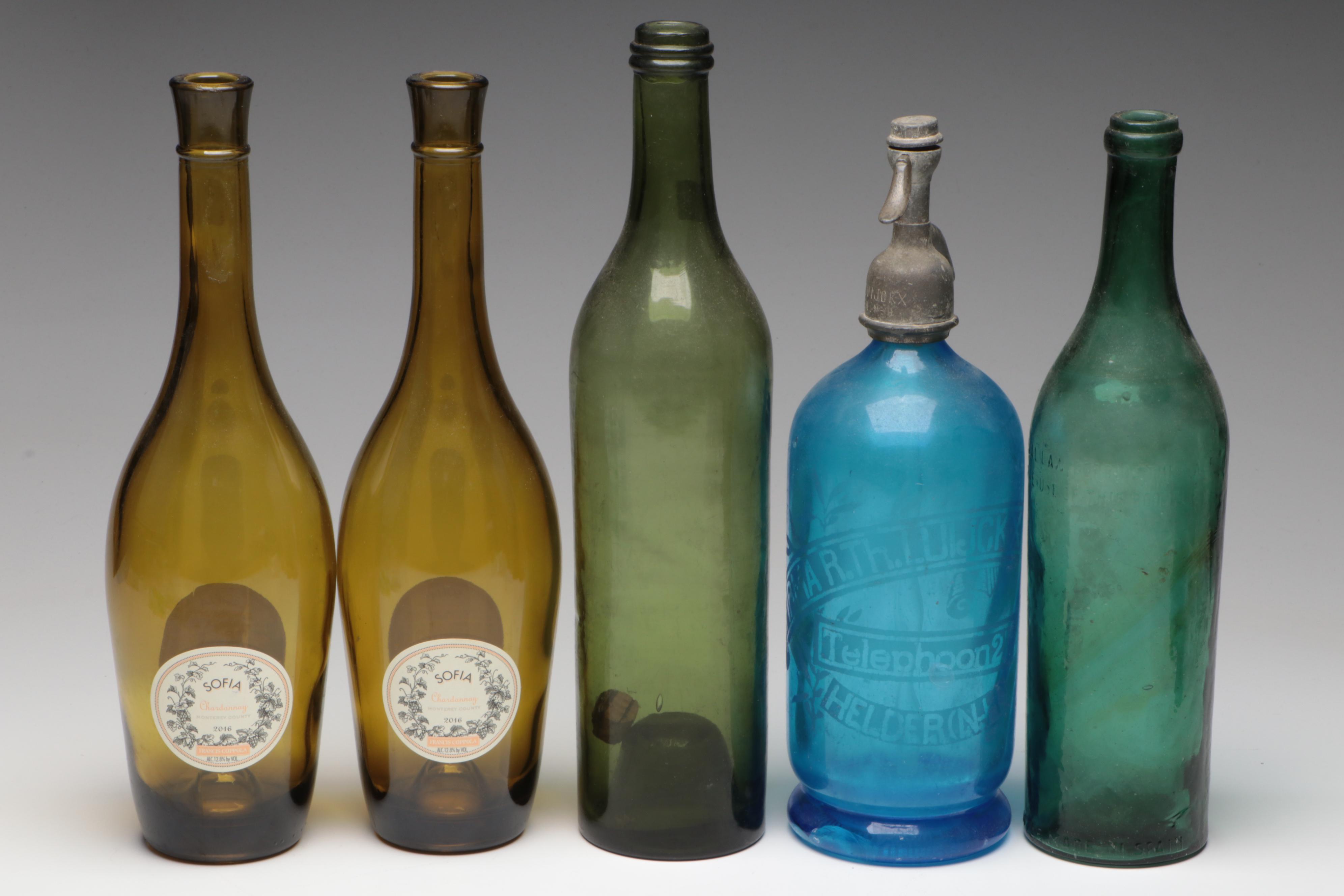 Art Deco Style Seltzer with Other Bottles and Stoppers