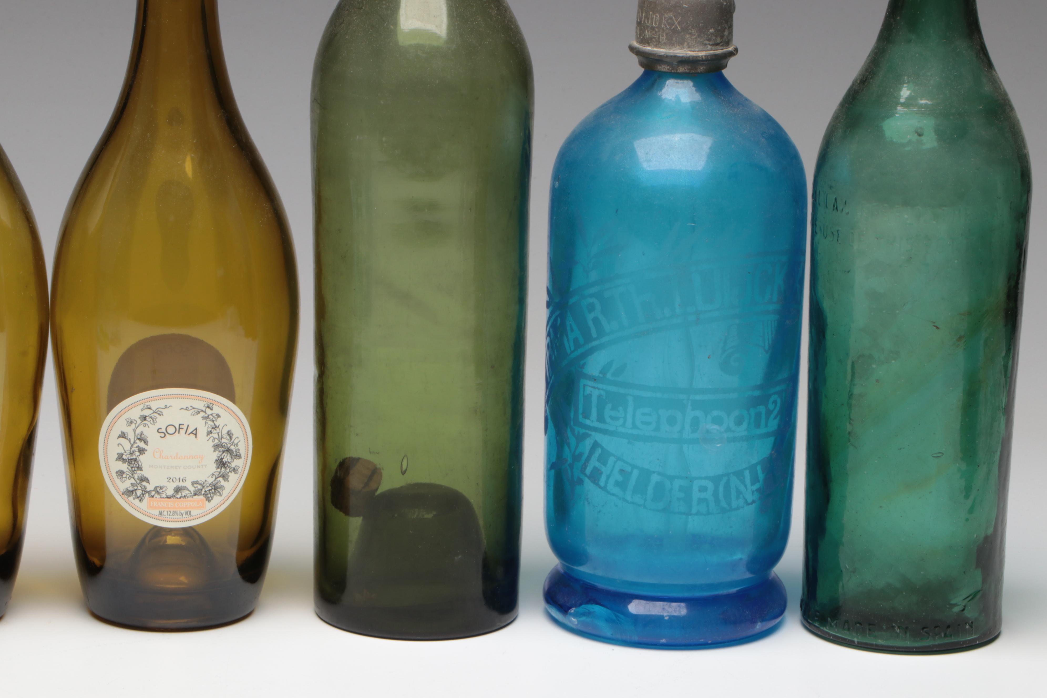 Art Deco Style Seltzer with Other Bottles and Stoppers