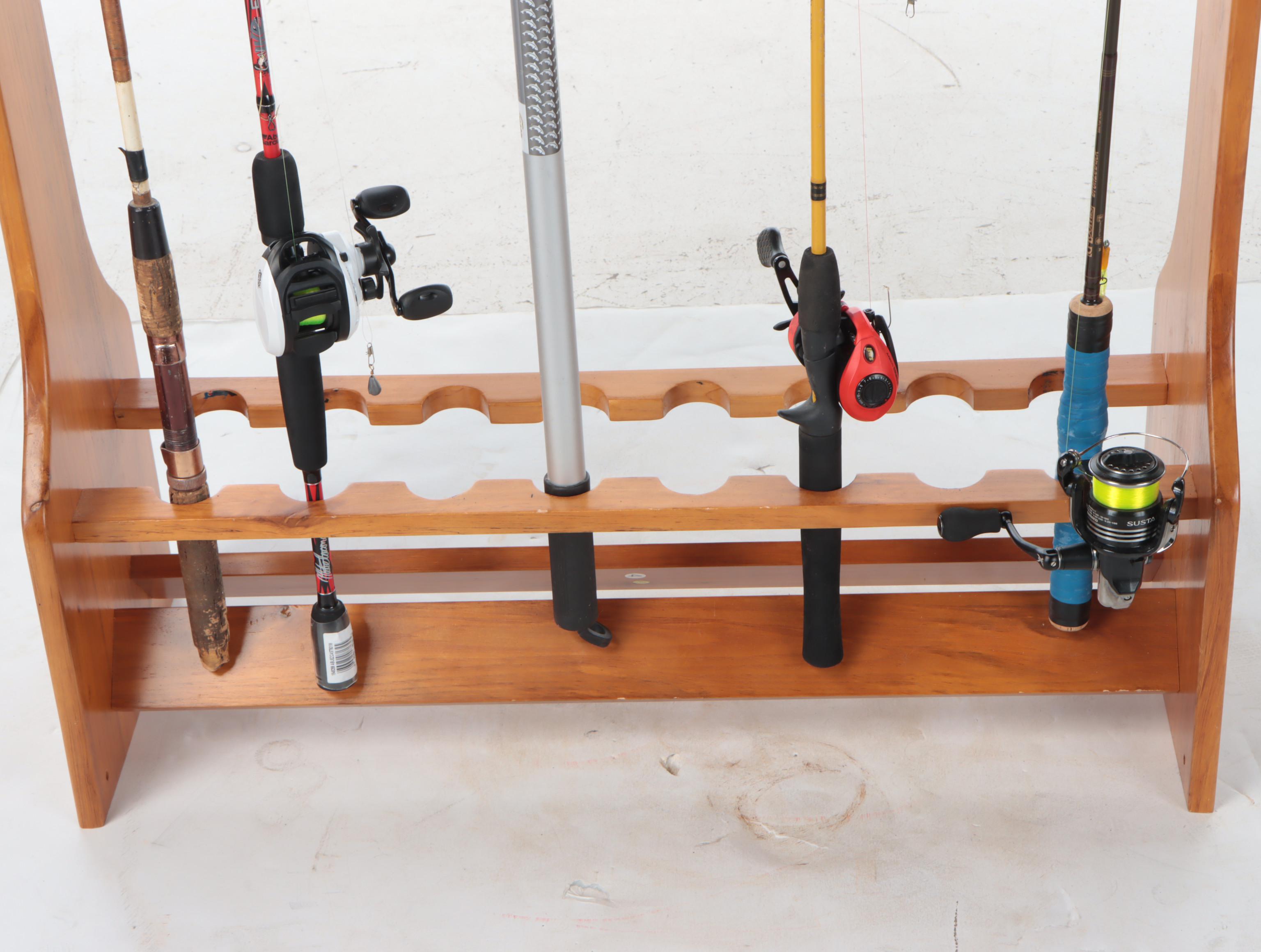 Abu Garcia Gen IKE EZ Cast and More Fishing Rods and Net in Wood Stand