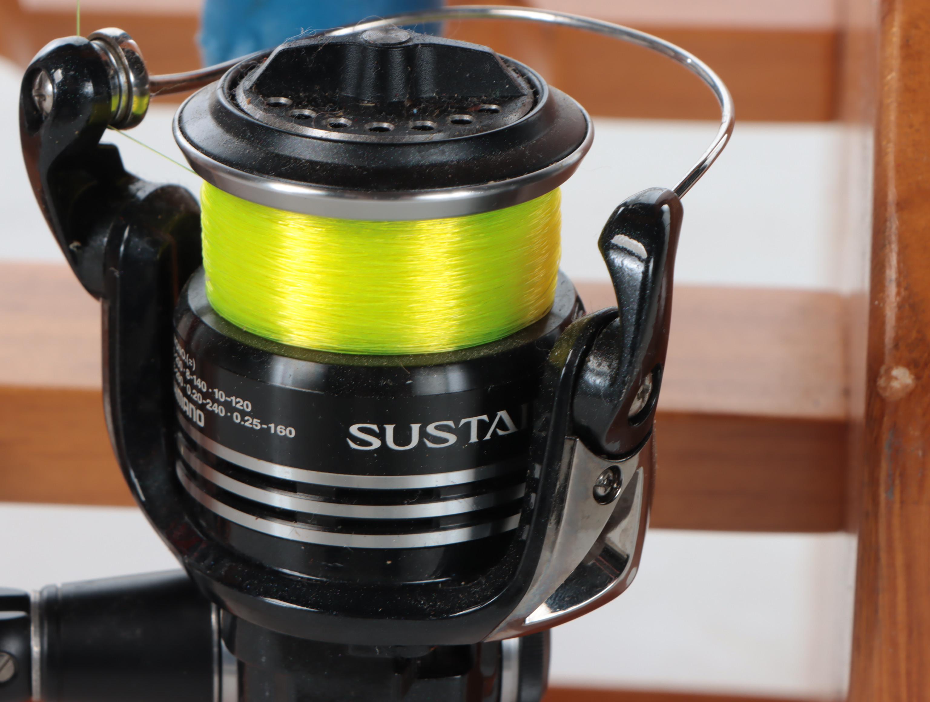 Abu Garcia Gen IKE EZ Cast and More Fishing Rods and Net in Wood Stand