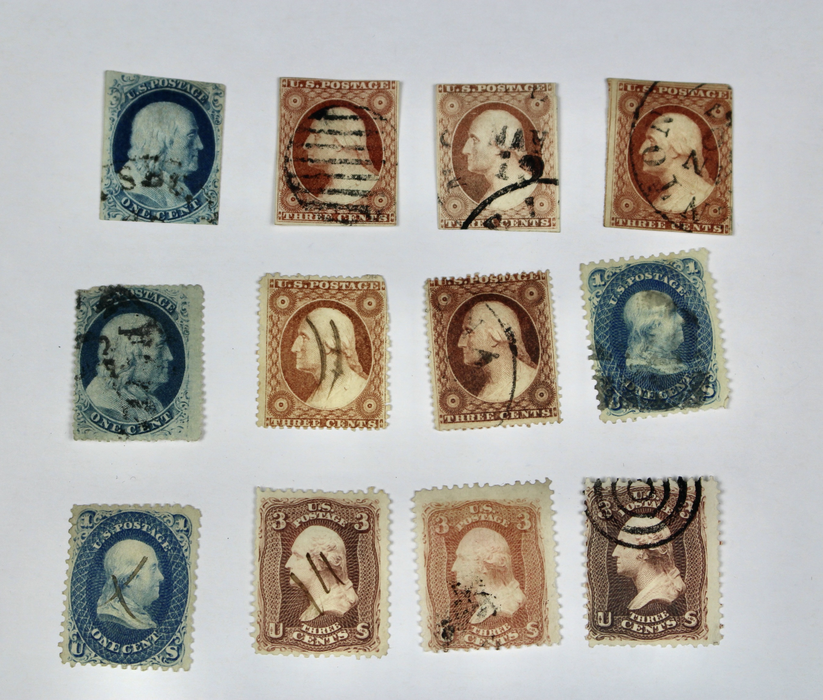 Twenty-Five Early U.S. Postage Stamps, Many with Grills