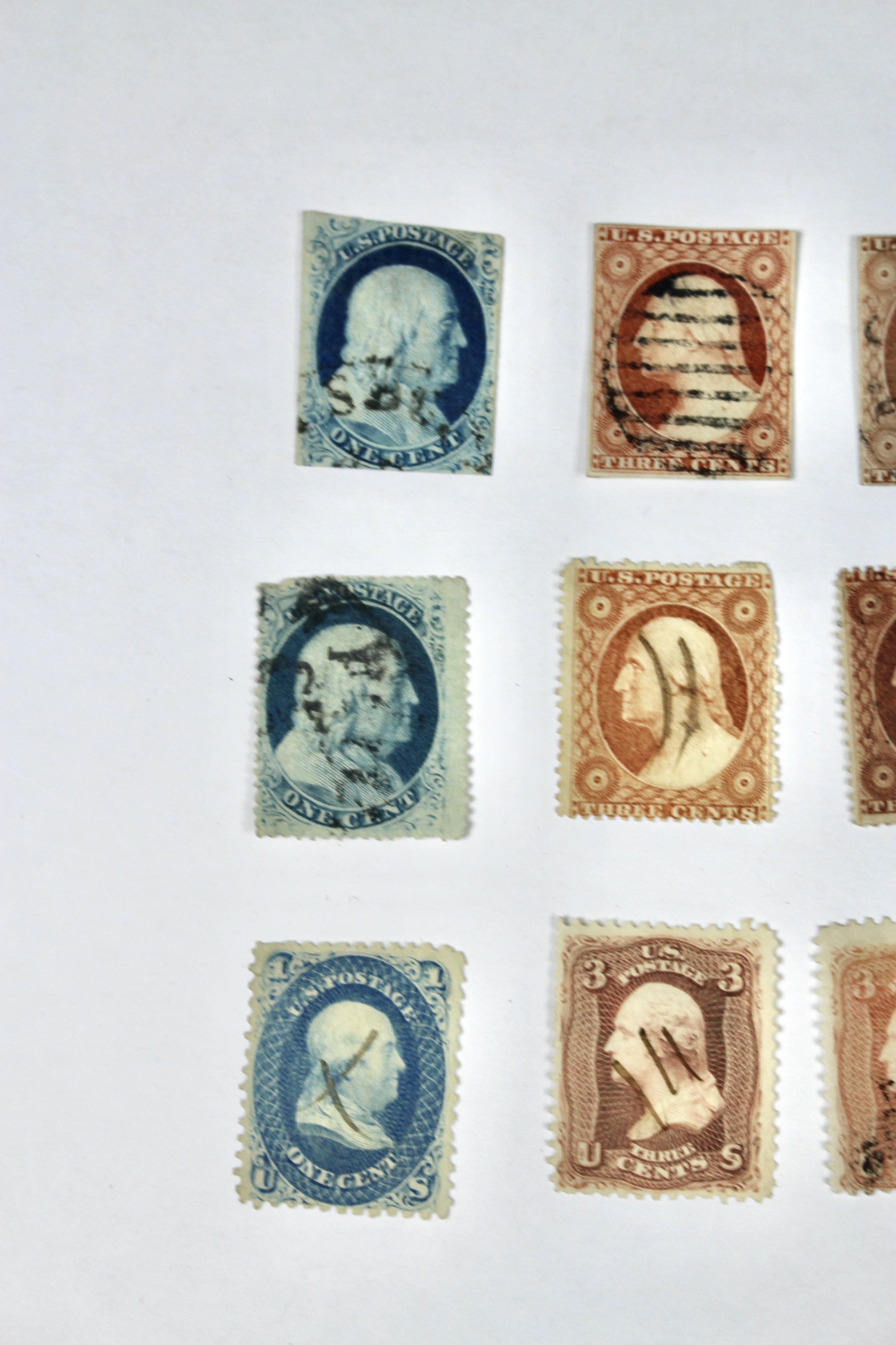 Twenty-Five Early U.S. Postage Stamps, Many with Grills