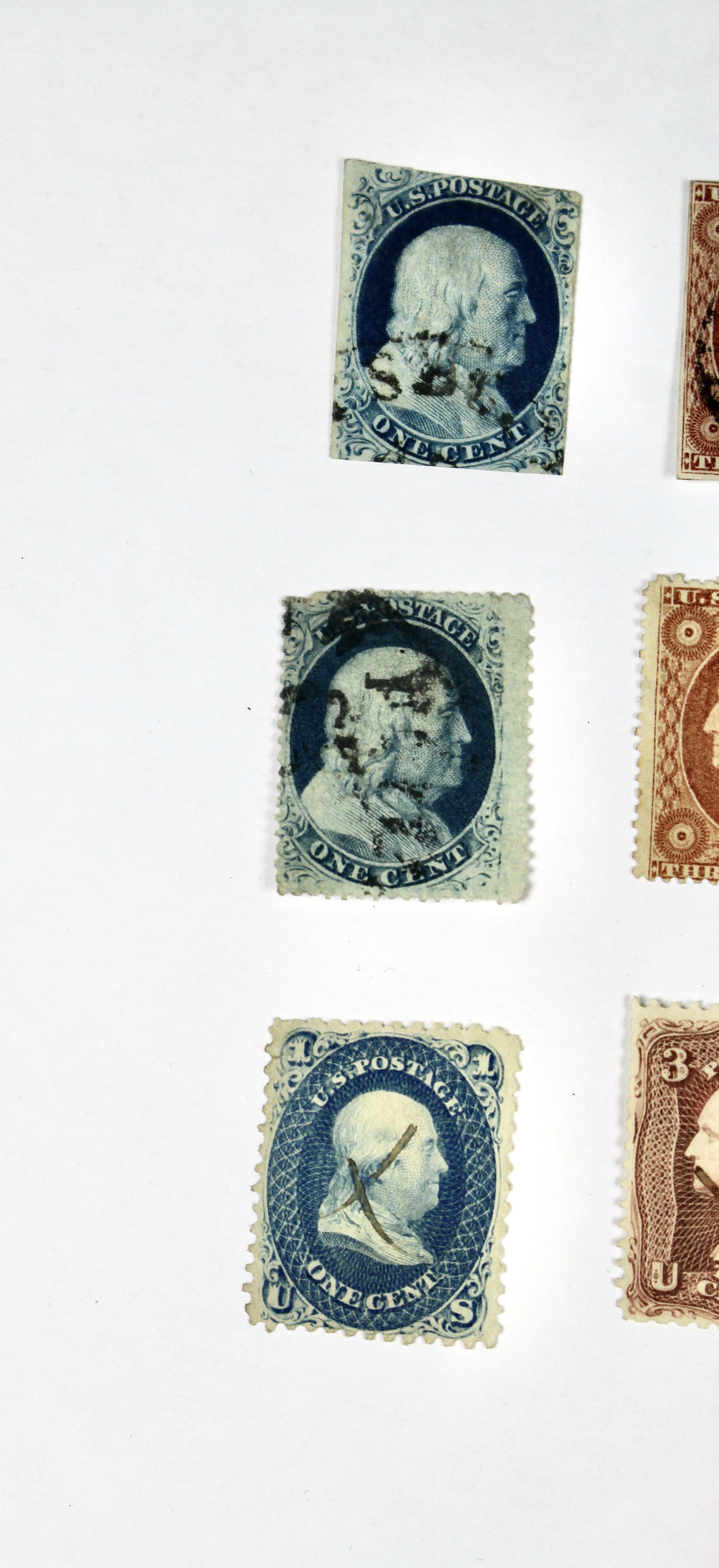 Twenty-Five Early U.S. Postage Stamps, Many with Grills