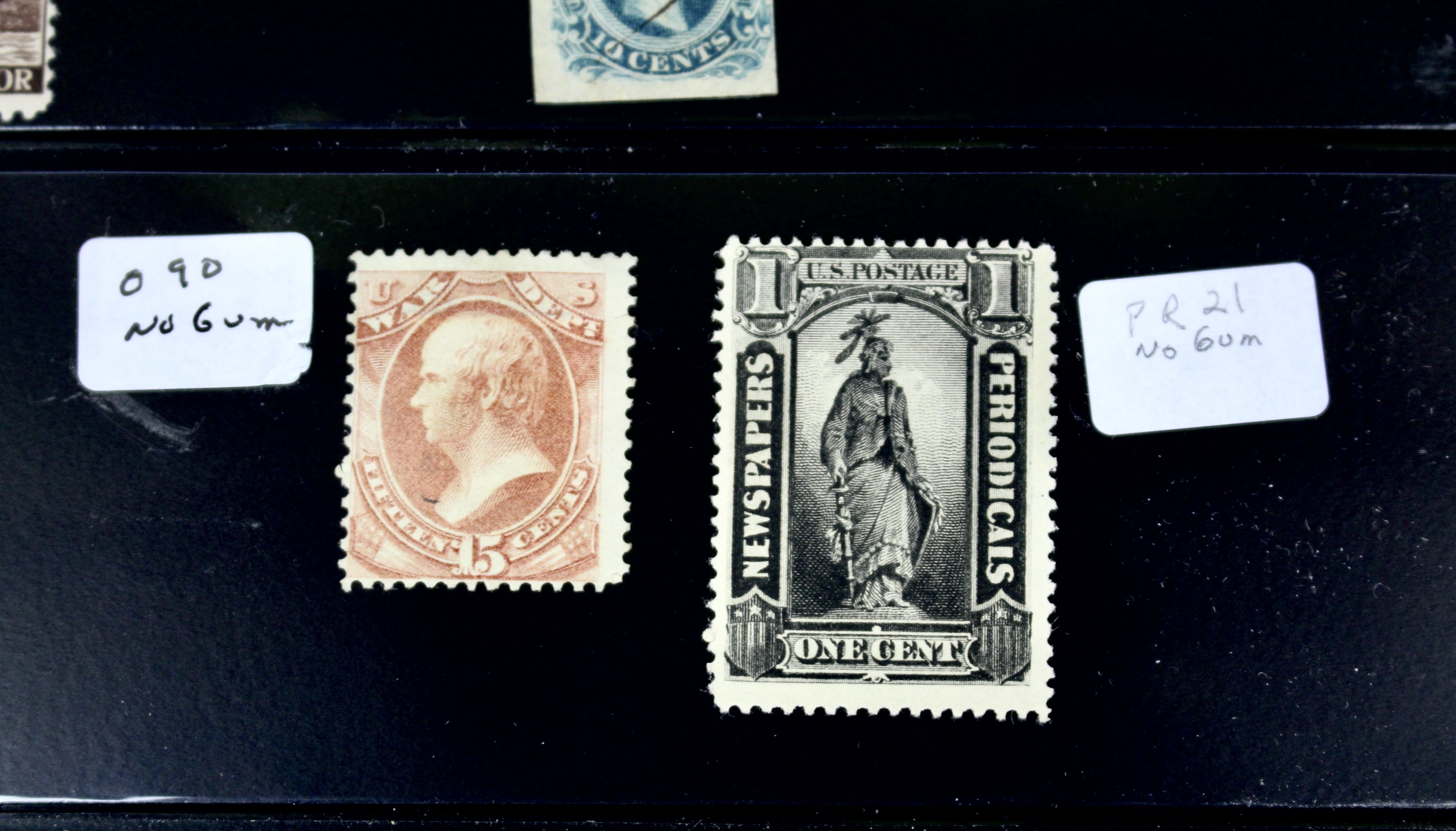 Twenty-Five Early U.S. Postage Stamps, Many with Grills