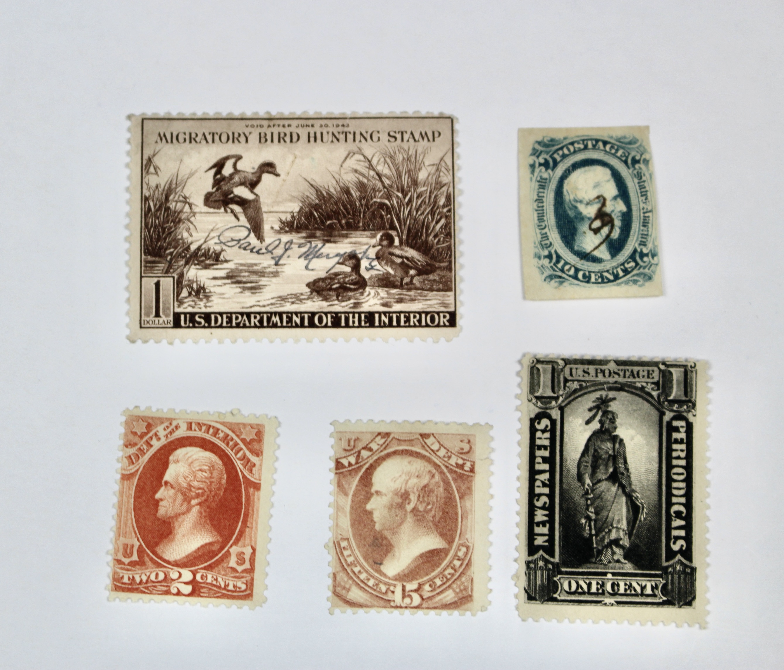 Twenty-Five Early U.S. Postage Stamps, Many with Grills