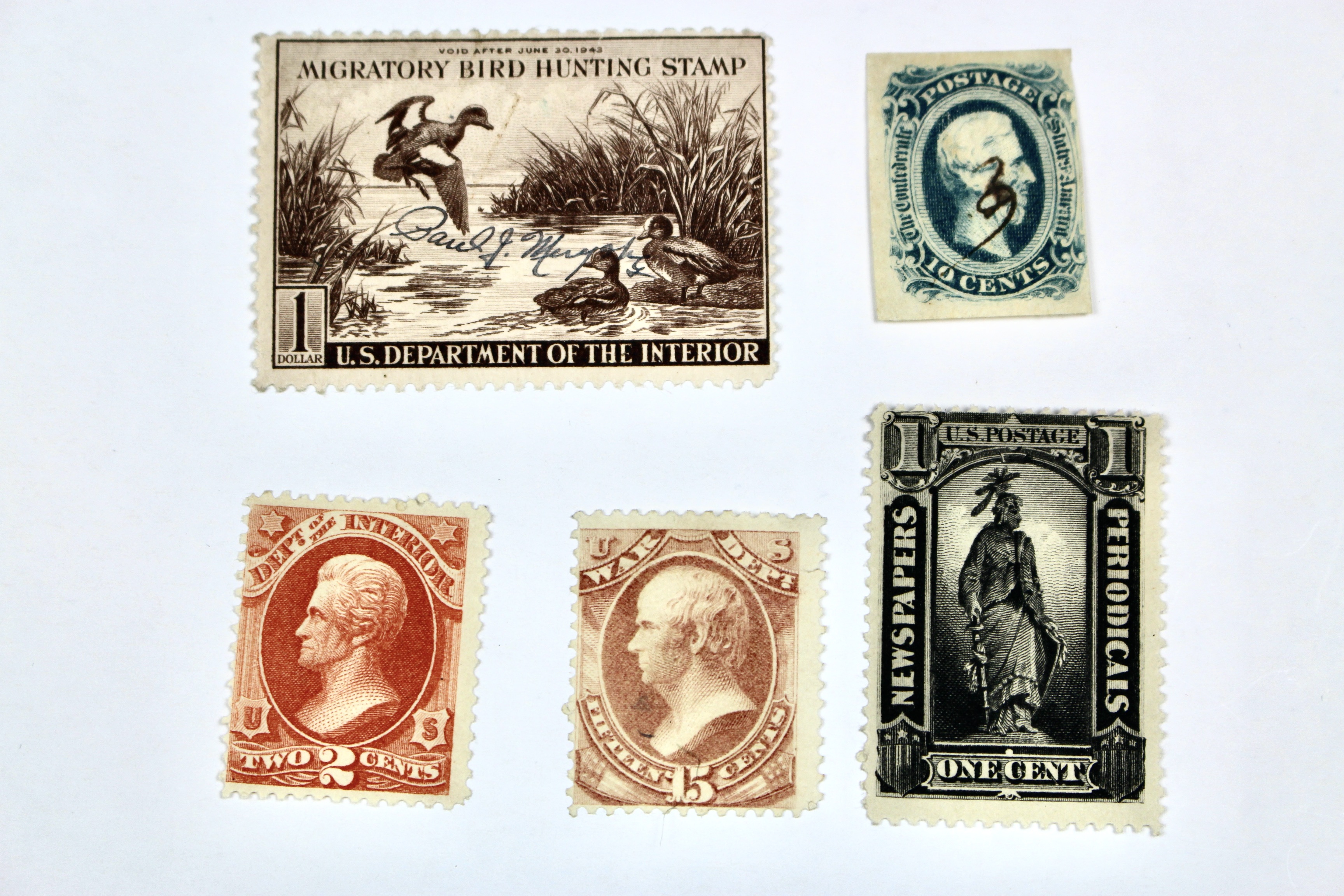 Twenty-Five Early U.S. Postage Stamps, Many with Grills